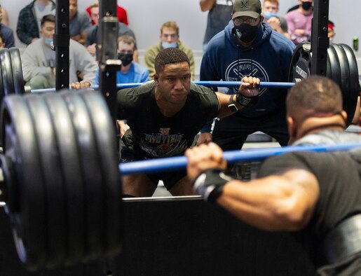 Anthony Bilal, Air Force Life Cycle Management Center, powers through his first squat at 500 pounds in the powerlifting competition in the Wright Field Fitness Center Dec. 11, 2020, at Wright-Patterson Air Force Base. Bilal went on to be the overall
winner of the event. (U.S. Air Force photo by R.J. Oriez)