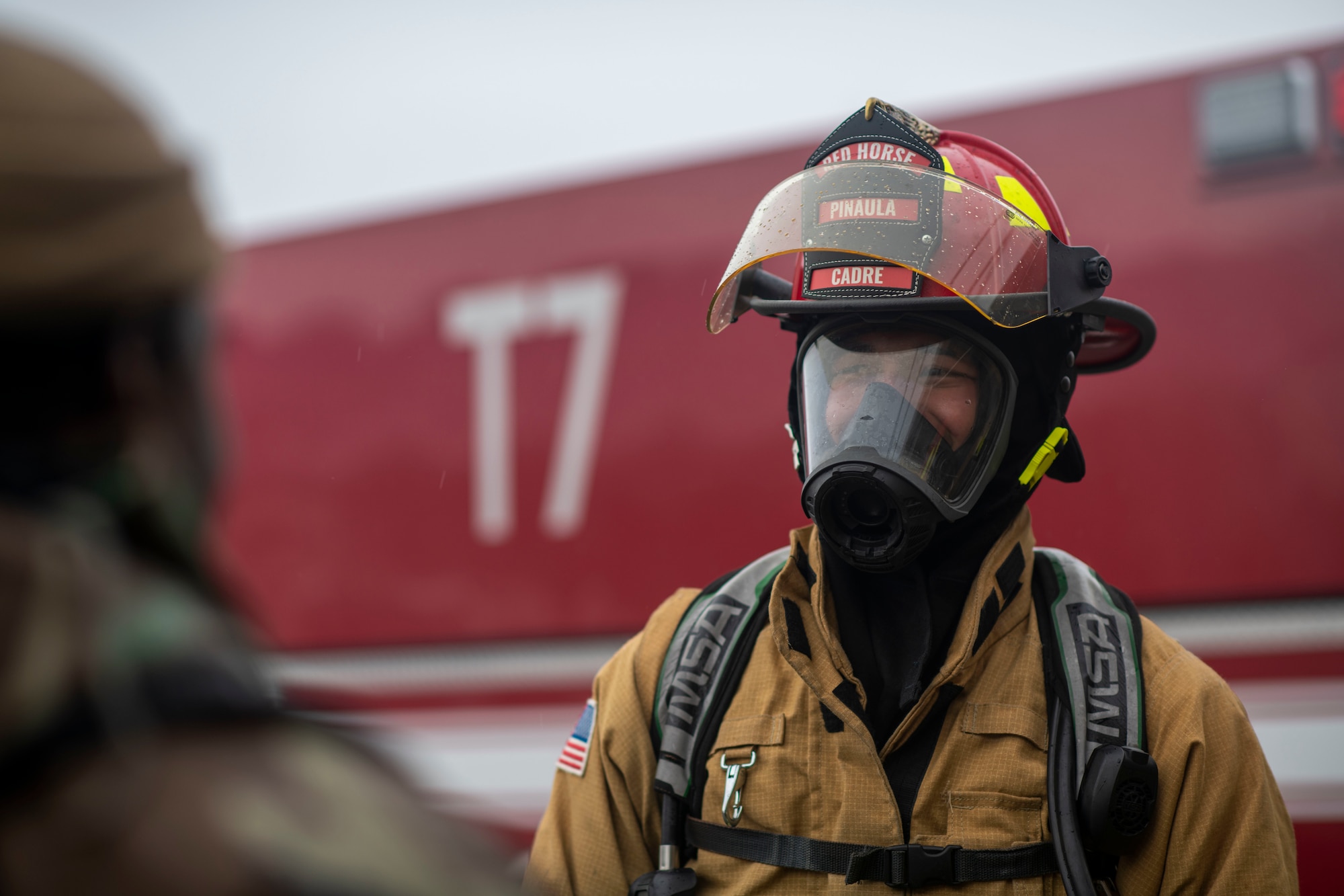 A fireman smiling