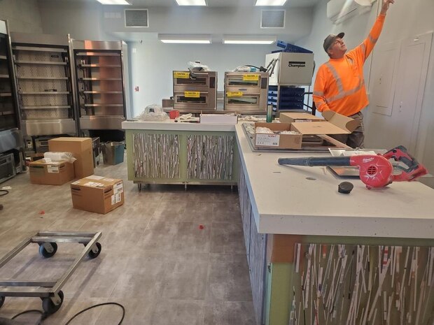 A contractor evaluates wall finishings at the Dragon’s Lair, Dec. 7, 2021, at Beale Air Force Base, California.