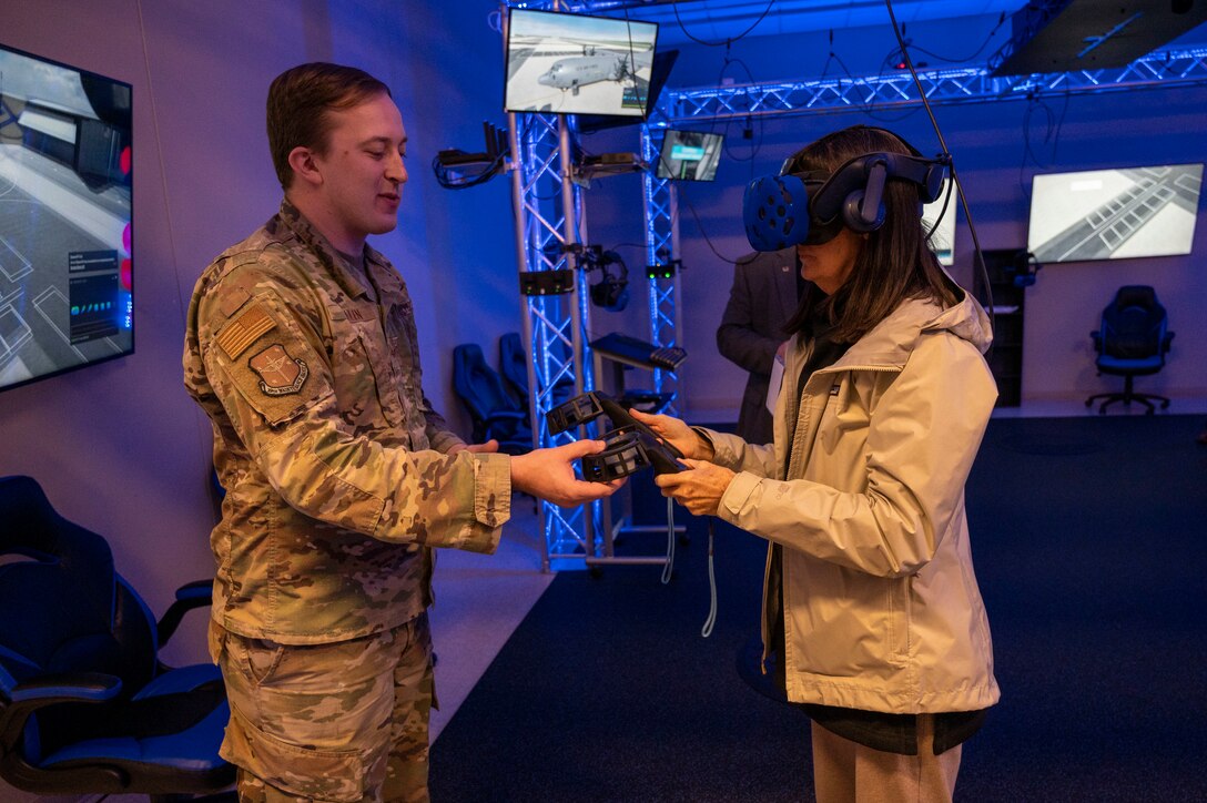 An honorary commander experiences the virtual reality maintenance facility.