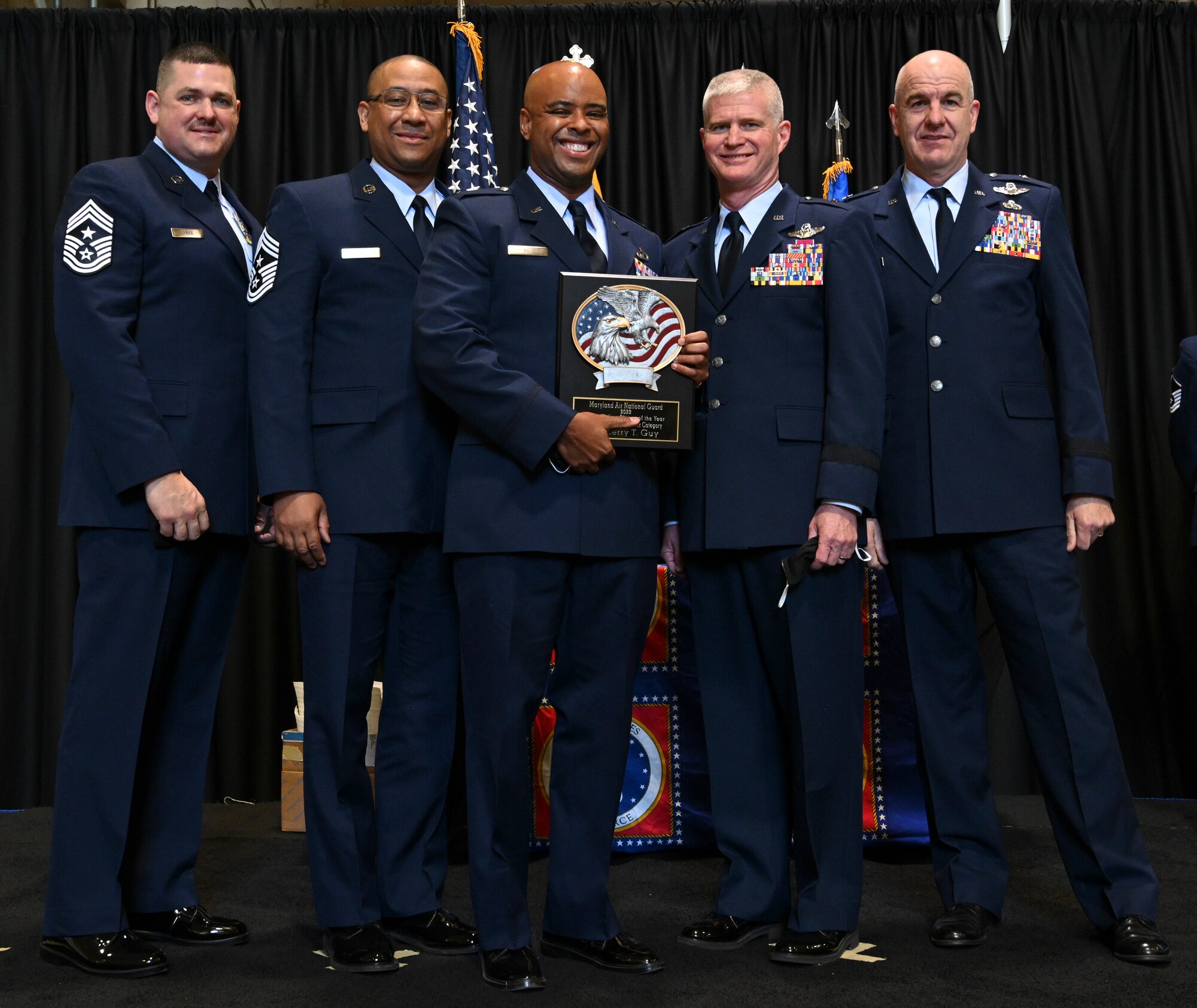U.S. Air Force 1st Lt. Kerry Guy, 175th Wing company grade officer of the Year, Maryland Air National Guard, receives a plaque at Warfield Air National Guard Base, Middle River, Md., during the 2021 Airman Recognition Ceremony. The yearly event pays tribute to the outstanding achievements of the Maryland Air National Guard and names the wing's outstanding Airman of the year. (U.S. Air National Guard photo by Amn Alexandra Huettner)