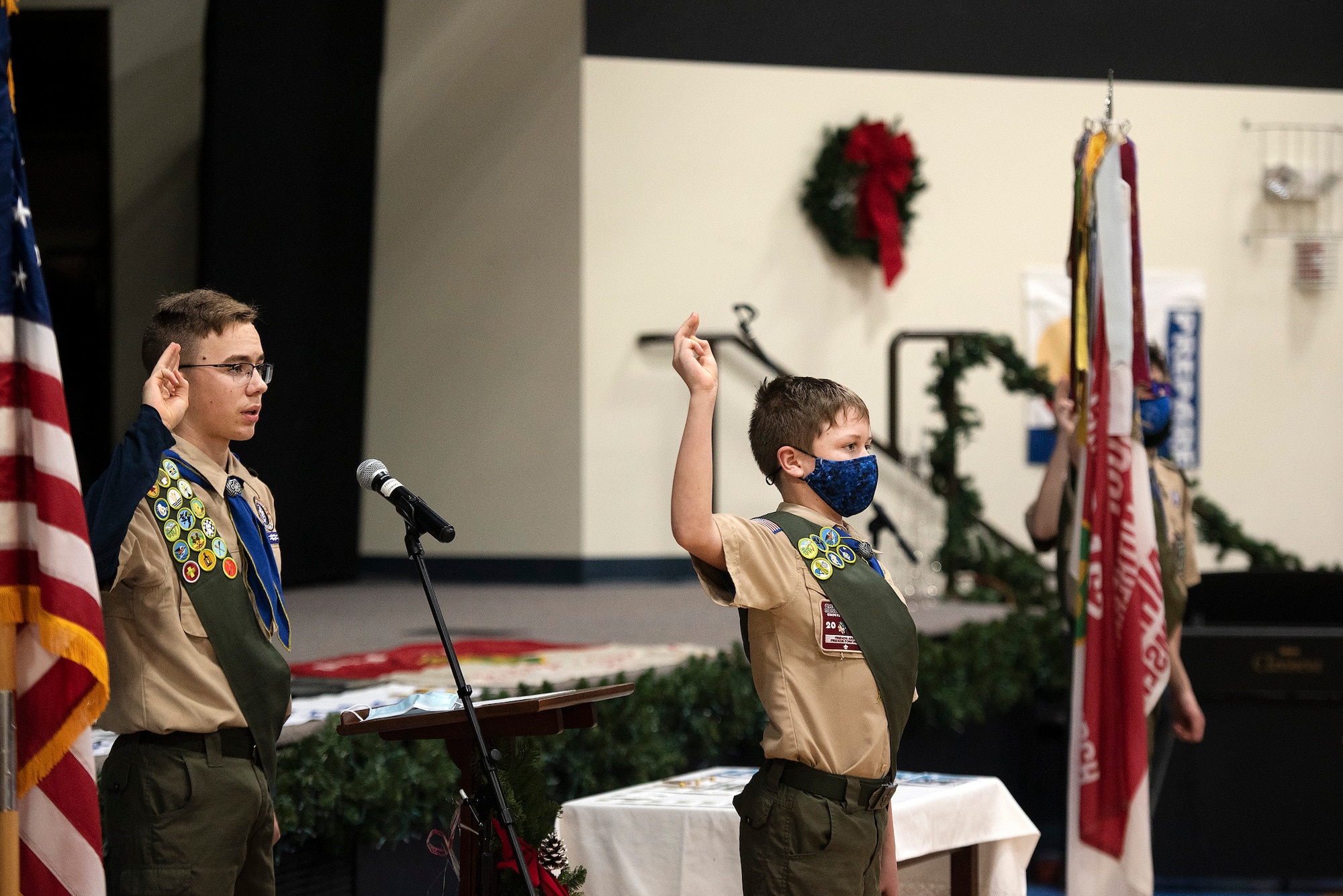 Wills Oberg (right) leads Boy Scout Troop 162 in the Scout Oath at the start of an event Dec. 13, 2021, in Fairborn, Ohio, marking the troop’s 75th anniversary. For the first 60 years of its existence, the troop was chartered by Wright-Patterson Air Force Base and still has a strong connection. (U.S. Air Force photo by R.J. Oriez)