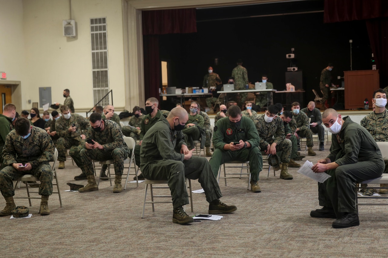 Marines get ready to receive vaccinations1.