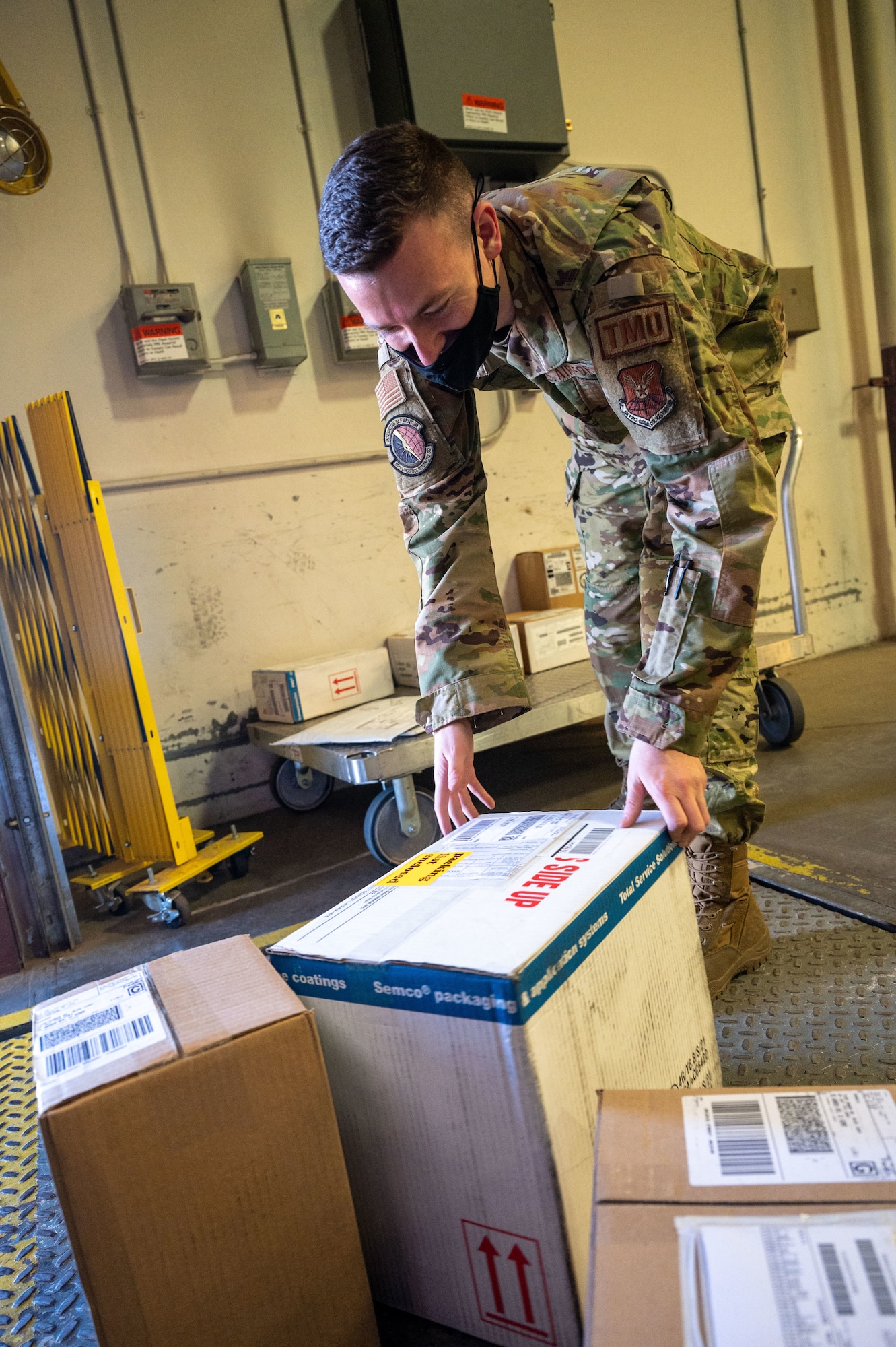 airman grabs a package