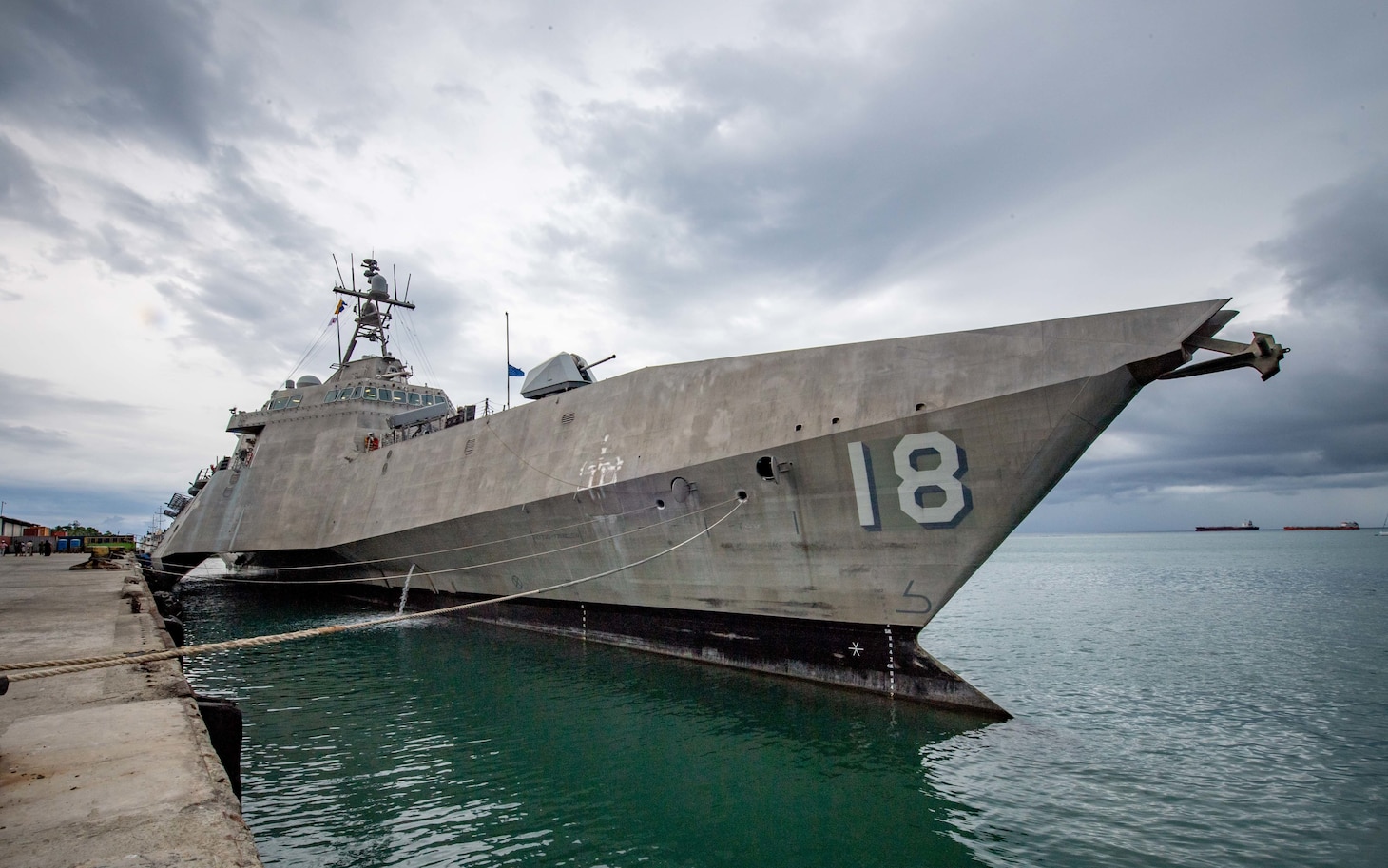 DILI, Timor-Leste (Dec. 8, 2021) Independence-variant littoral combat ship USS Charleston (LCS 18), moored pier side during a port visit to Dili, Timor-Leste. Charleston, part of Destroyer Squadron (DESRON) 7, is on a rotational deployment in the U.S. 7th Fleet area of operation to enhance interoperability with partners and serve as a ready-response force in support of a free and open Indo-Pacific region. (U.S. Navy photo by Mass Communication Specialist 2nd Class Ryan M. Breeden)