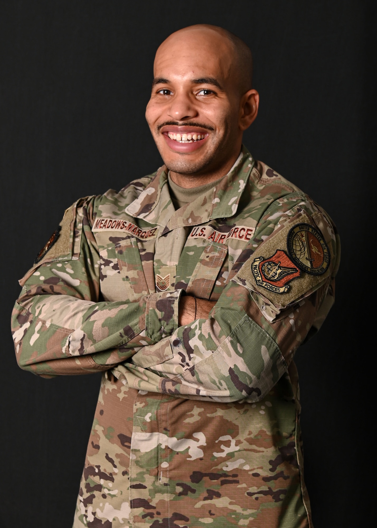 U.S. Air Force Tech. Sgt. William Meadows Marquez, an instructor at Airman Leadership School, Andersen AFB, is highlighted as an instructor at Andersen Air Force Base, Guam, Nov. 30, 2021. Meadows Marquez and the other ALS instructors at Andersen AFB continuously update their curriculum each class as professional military education continues to evolve. Meadows Marquez mentored more than 200 Airmen directly through 18 different classes over the past three years. (U.S. Air Force photo by Senior Airman Aubree Owens)