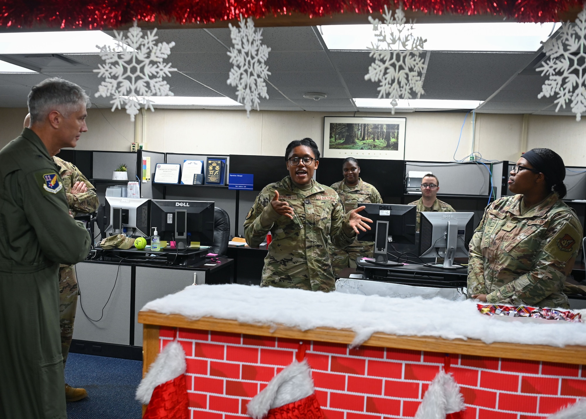 U.S. Air Force Staff Sgt. Kamilah Dublin, noncommissioned officer in charge of customer service with the 36th Civil Engineer Squadron, speaks on behalf of her Airman, U.S. Air Force Senior Airman Aakira Ard, a customer service technician with the 36 CES, in front of base leadership at Andersen Air Force Base, Guam, Dec. 15, 2021. The Team Andersen Linebacker of the Week recognizes outstanding enlisted, officer, civilian and total force personnel who have had an impact on achieving Team Andersen’s Mission, Vision and Priorities. (U.S. Air Force photo by Senior Airman Aubree Owens)