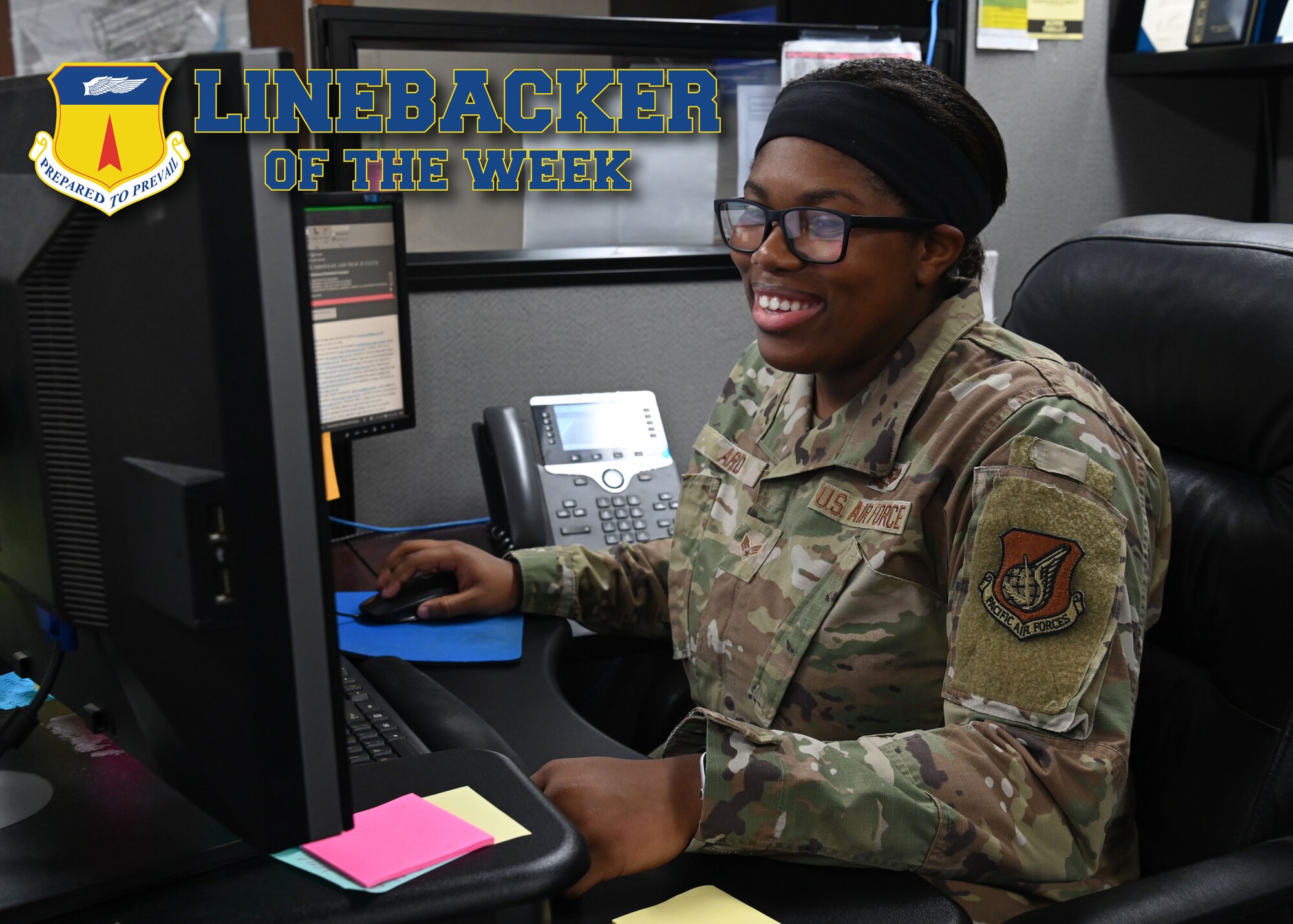 U.S. Air Force Senior Airman Aakira Ard, a customer service technician with the 36th Civil Engineer Squadron, works at her desk after receiving the Linebacker of the Week award at Andersen Air Force Base, Guam, Dec. 17, 2021. The Team Andersen Linebacker of the Week recognizes outstanding enlisted, officer, civilian and total force personnel who have had an impact on achieving Team Andersen’s Mission, Vision and Priorities. (U.S. Air Force photo by Senior Airman Aubree Owens)