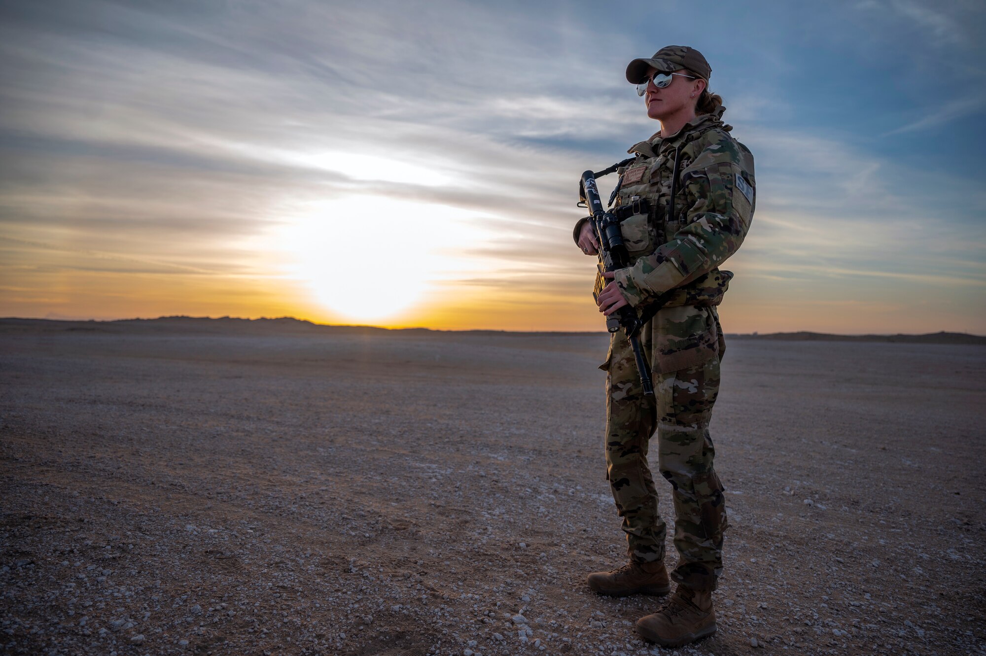 An Airman scans Ali Al Salem Air Base’s security zone for any possible threats