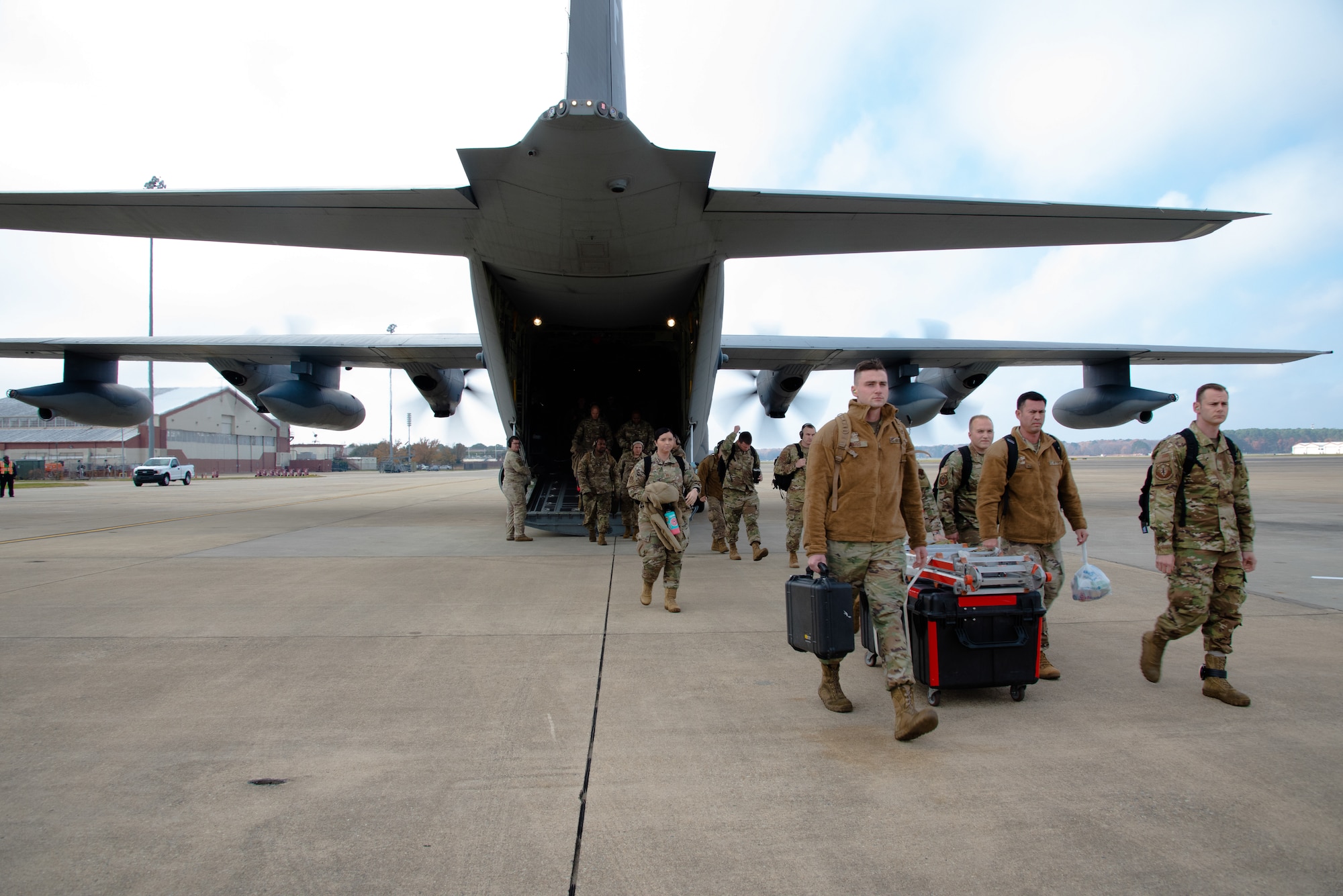 Photo of U.S. Air Force Airmen from the 23d Wing, Moody Air Force Base, deplane at Joint Base Langley-Eustis, Virginia