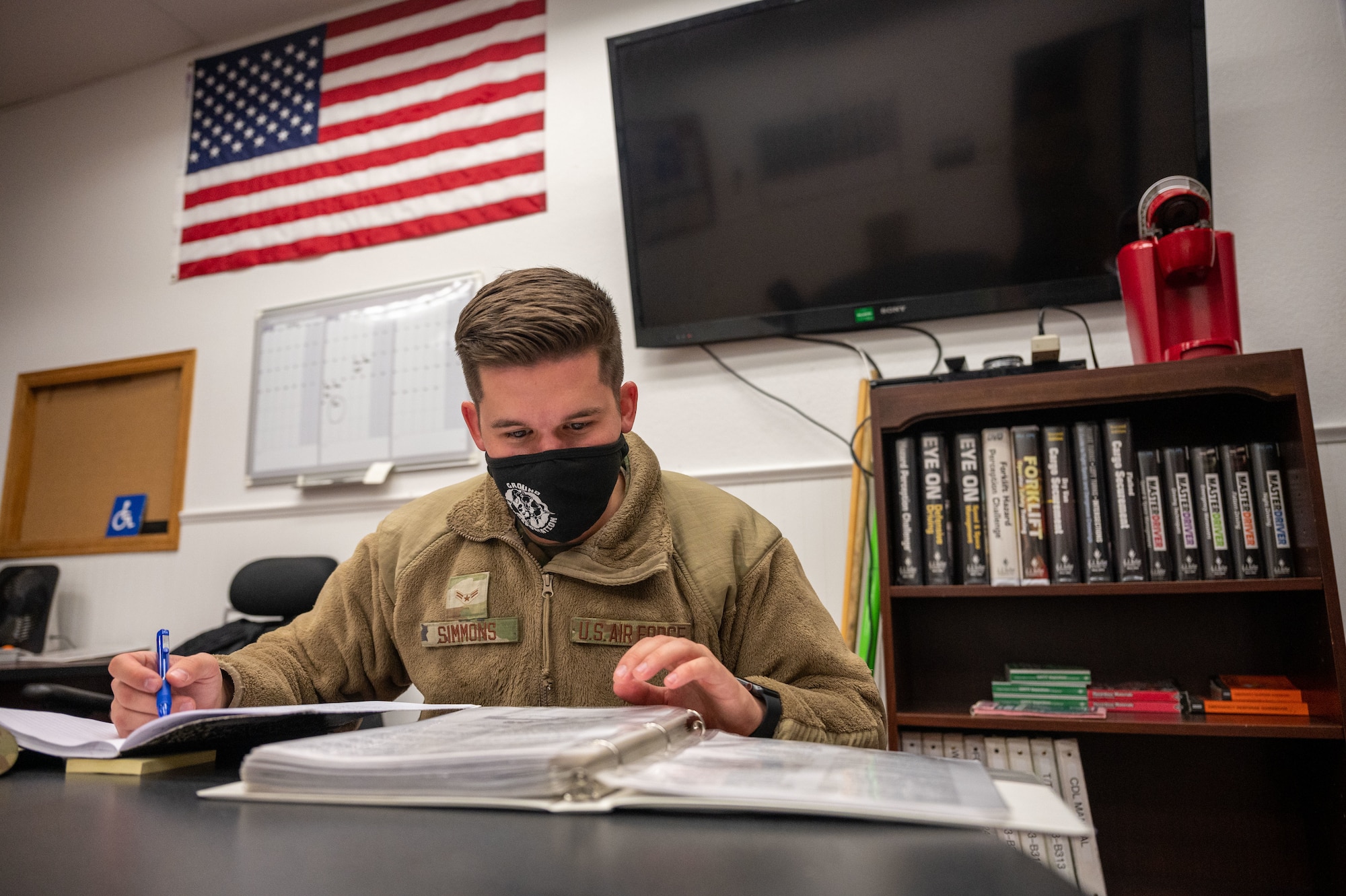 Airman at desk