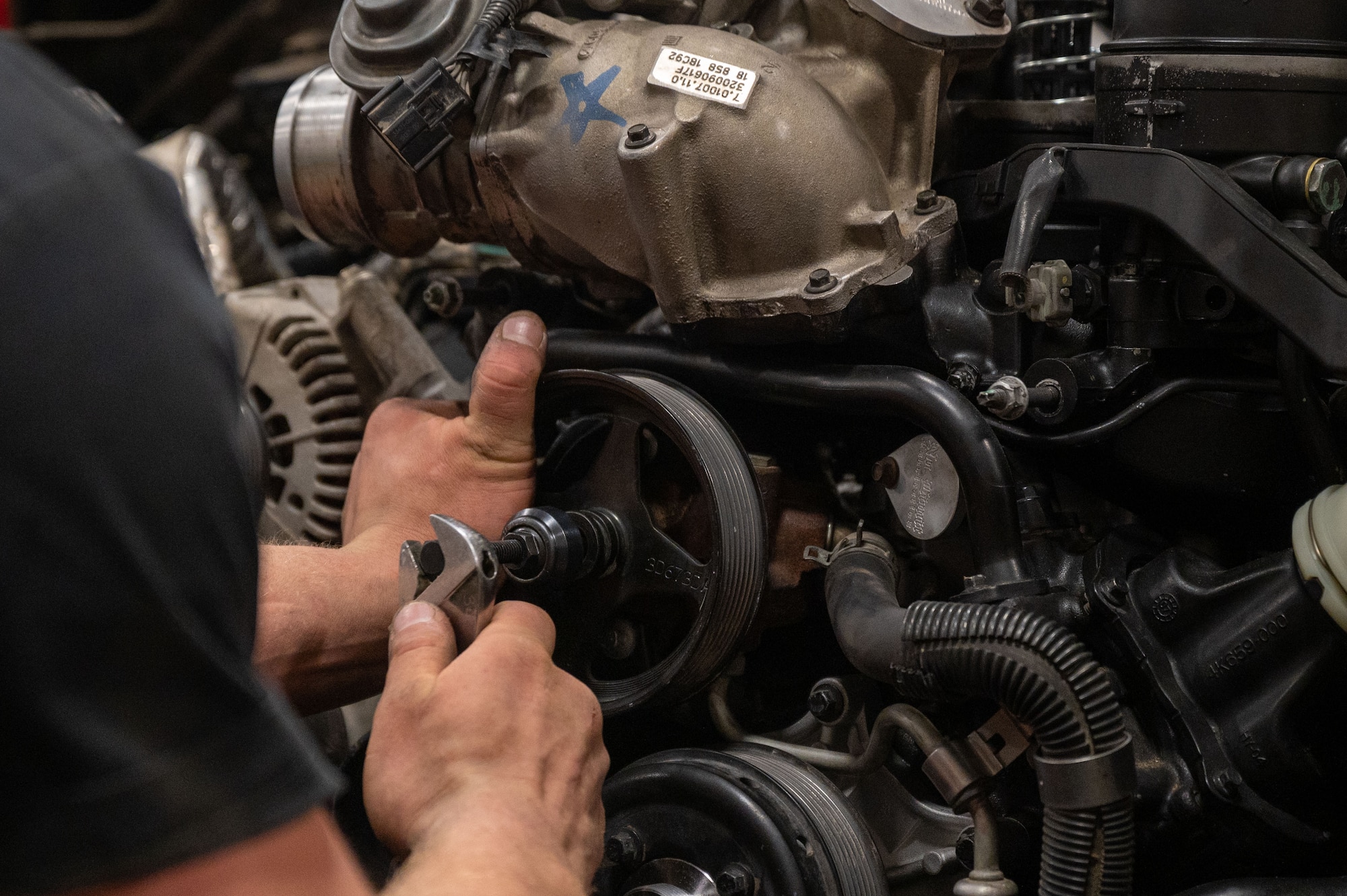 airman working on a vehicle