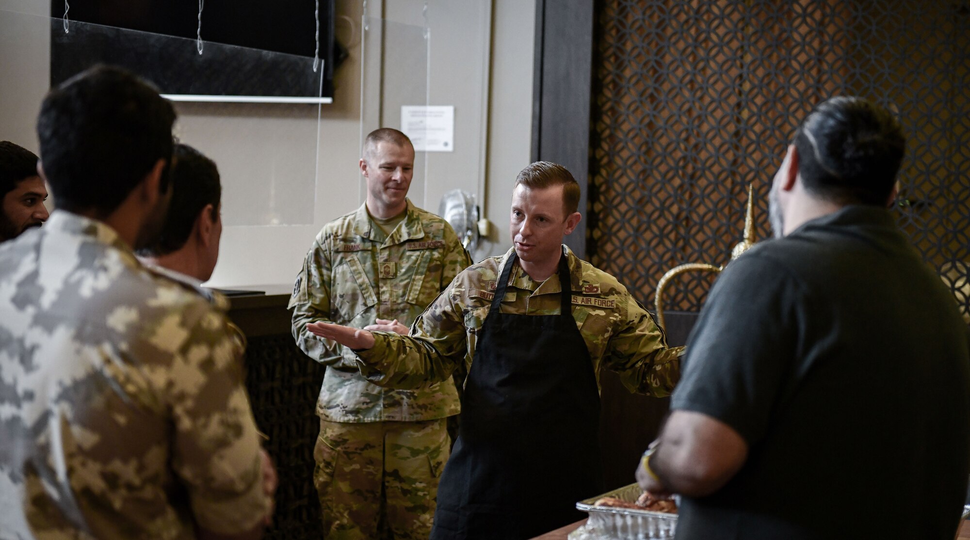 U.S. service member addresses Qatari Service members before