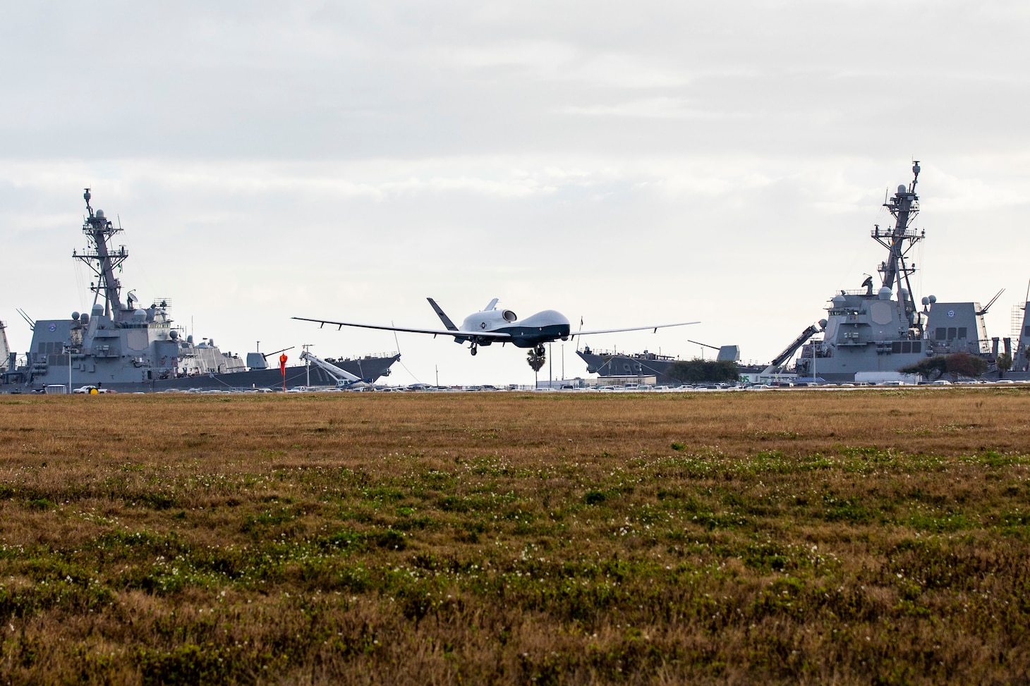 An MQ-4C Triton Unmanned Aircraft System (UAS), assigned to Unmanned Patrol Squadron 19 (VUP-19), lands