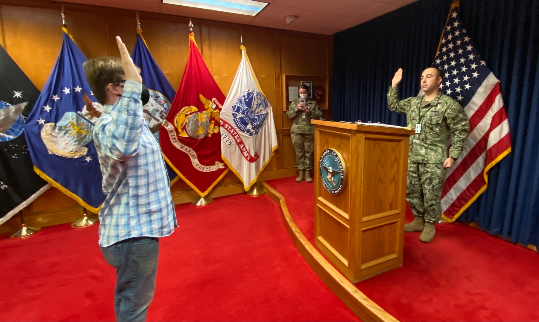 Amarillo MEPS Commander, Lieutenant Commander Luke D. Freeman issues the Oath of Enlistment to the station's first Space Force applicant.