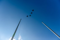 Four F-35A Lightning IIs assigned to the 158th Fighter Wing, Vermont Air National Guard, fly in formation over September drill's 9/11 remembrance ceremony at the wing’s flagpole, Vermont Air National Guard base, South Burlington, Vermont, Sept. 11, 2021. Known as 9/11, this year marks the 20th anniversary of the coordinated terrorist attacks on the morning of Sept. 11, 2001. (U.S. Air National Guard photo by Julie M. Paroline)