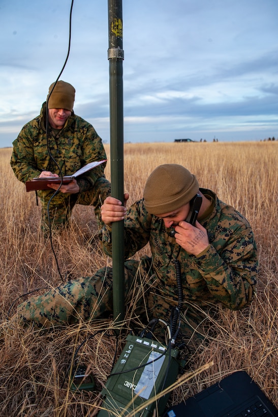 U.S. Marine Corps Master Sgt. Canon Richard, a native of Kinder, La., and an operations chief with 2d Marine Division (MARDIV), scores a Marine during the 2d MARDIV High-Frequency (HF) Competition at Fort Sill, Okla., Dec. 6, 2021. The competition enhanced HF transmission proficiency and capabilities to prepare Marines for future expeditionary conflicts where areas may be either contested or degraded. (U.S. Marine Corps photo by Cpl. Elijah J. Abernathy)