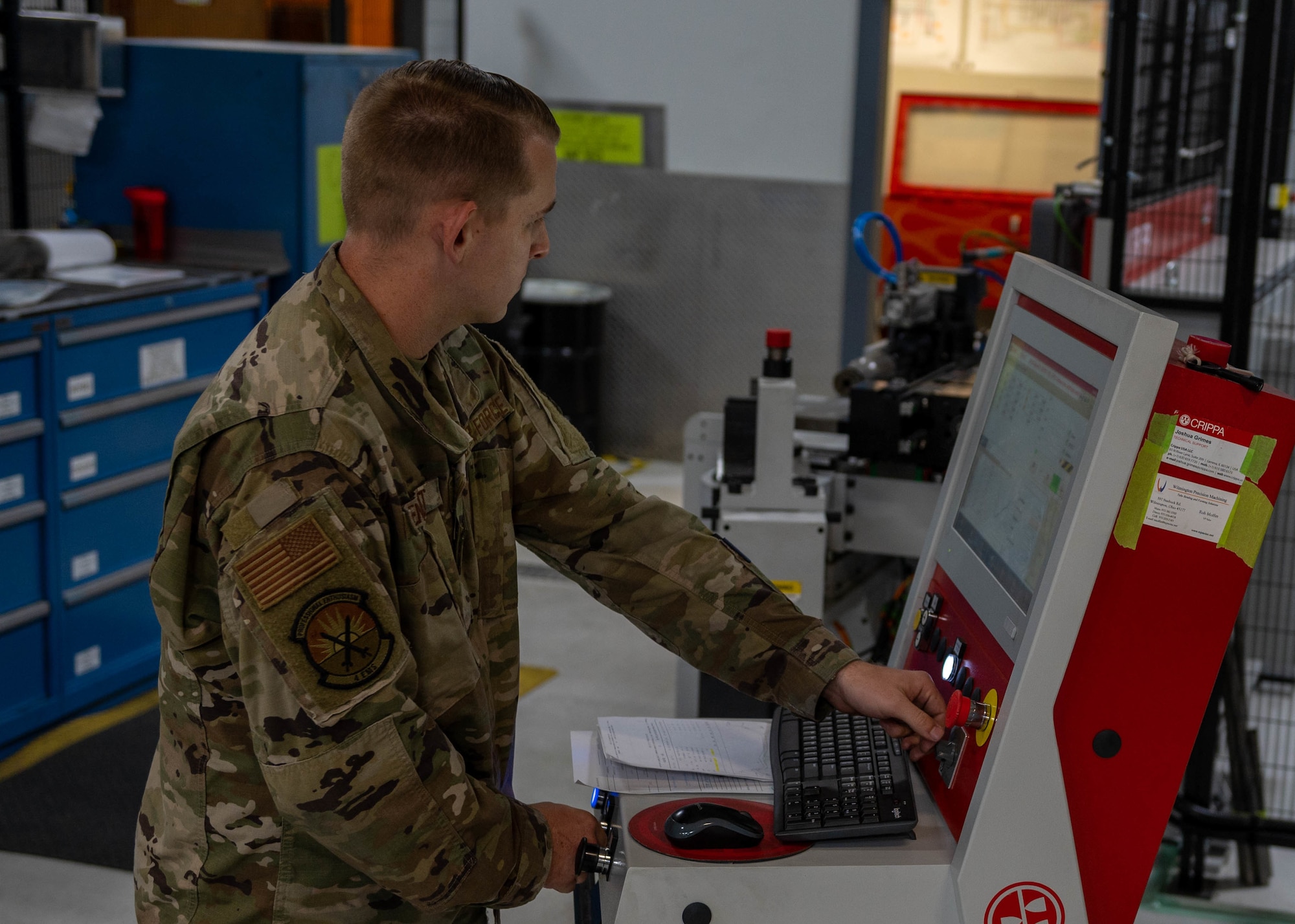Staff Sgt. Justin Bennett, 4th Equipment Maintenance Squadron aircraft structure technician, uses Crippa, a computerized tube bender, to bend a line for an F-15E Strike Eagle at Seymour Johnson Air Force Base, North Carolina, Nov. 2, 2021.