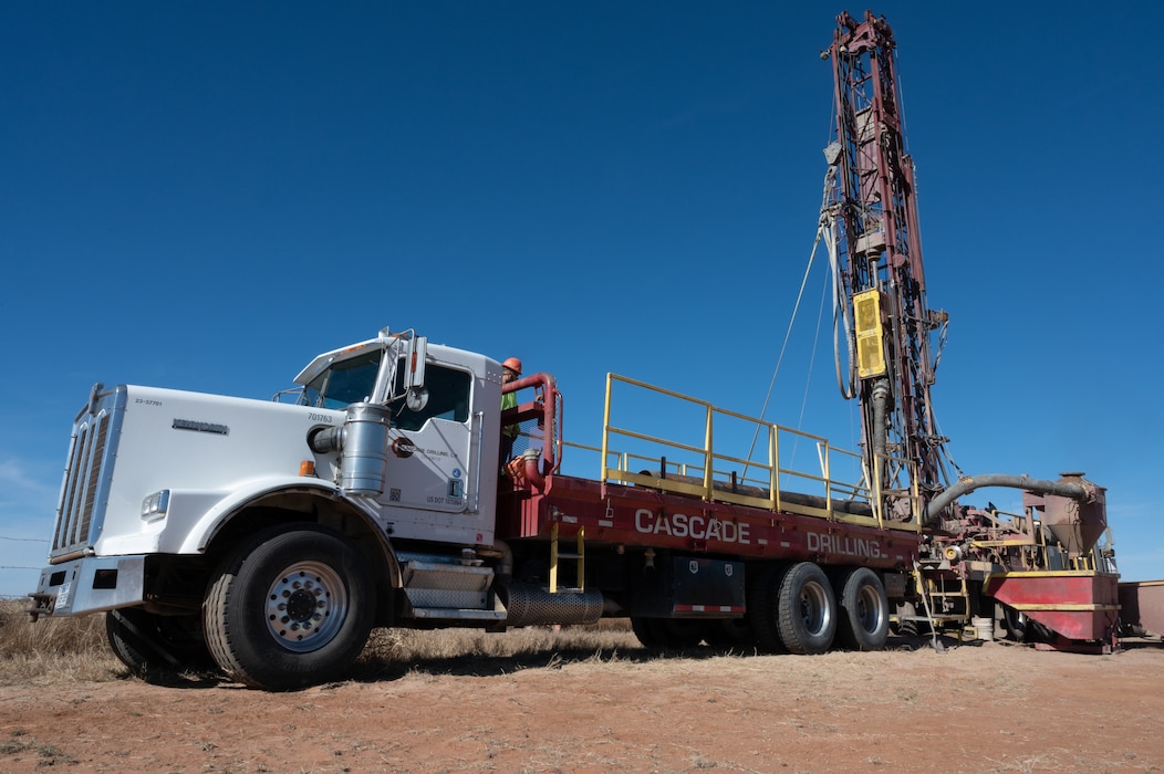 Contractors with Brice Construction Ltd. deploy an air rotary drilling rig as part of a pilot study civil engineering project during a per- and polyfluoroalkyl remedial investigation Nov. 18, 2021, at Cannon Air Force Base, New Mexico. In May 2021, the U.S. Air Force awarded a $16.6M contract to Cannon AFB for an Engineering Evaluation/Cost Analysis, or "EE/CA," with a pilot study to evaluate and determine the appropriate interim responses to implement while the investigation is ongoing. Data collected from the pilot study will provide information and help expedite implementation of recommended actions determined by the EE/CA.