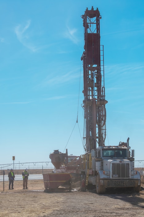 Contractors with Brice Construction Ltd. deploy an air rotary drilling rig as part of a pilot study civil engineering project during a per- and polyfluoroalkyl remedial investigation Nov. 18, 2021, at Cannon Air Force Base, New Mexico. In May 2021, the USAF awarded a $16.6M contract for an Engineering Evaluation/Cost Analysis, or "EE/CA," with a pilot study to evaluate and determine the appropriate interim responses to implement while the investigation is ongoing. In accordance with the Comprehensive Environmental Response, Compensation, and Liability Act framework, an EE/CA is required to satisfy environmental review requirements for interim responses.