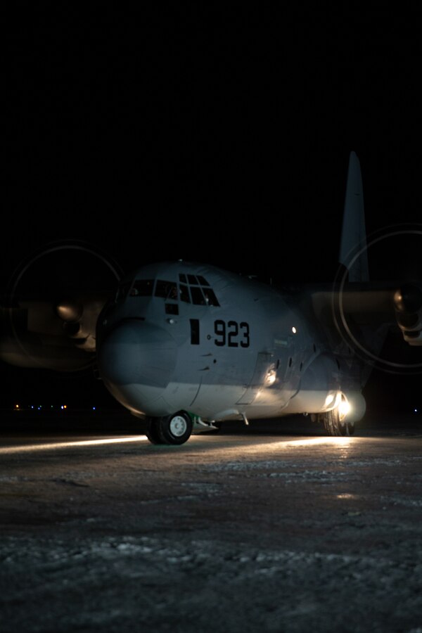 A U.S. Marine Corps KC-130J Super Hercules assigned to Marine Aerial Refueler Transport Squadron 152, 1st Marine Aircraft Wing, taxis the runway to deliver the snowmobiles and gear in support of Marines with Delta Company, 4th Law Enforcement Battalion, Marine Forces Reserve at Kotzebue, Alaska, Dec. 8, 2021. The Marine Corps Reserves hosts the Toys for Tots program collects donations of toys and delivers them to school-aged children across the United States. (U.S. Marine Corps photo by Cpl. Brendan Mullin)