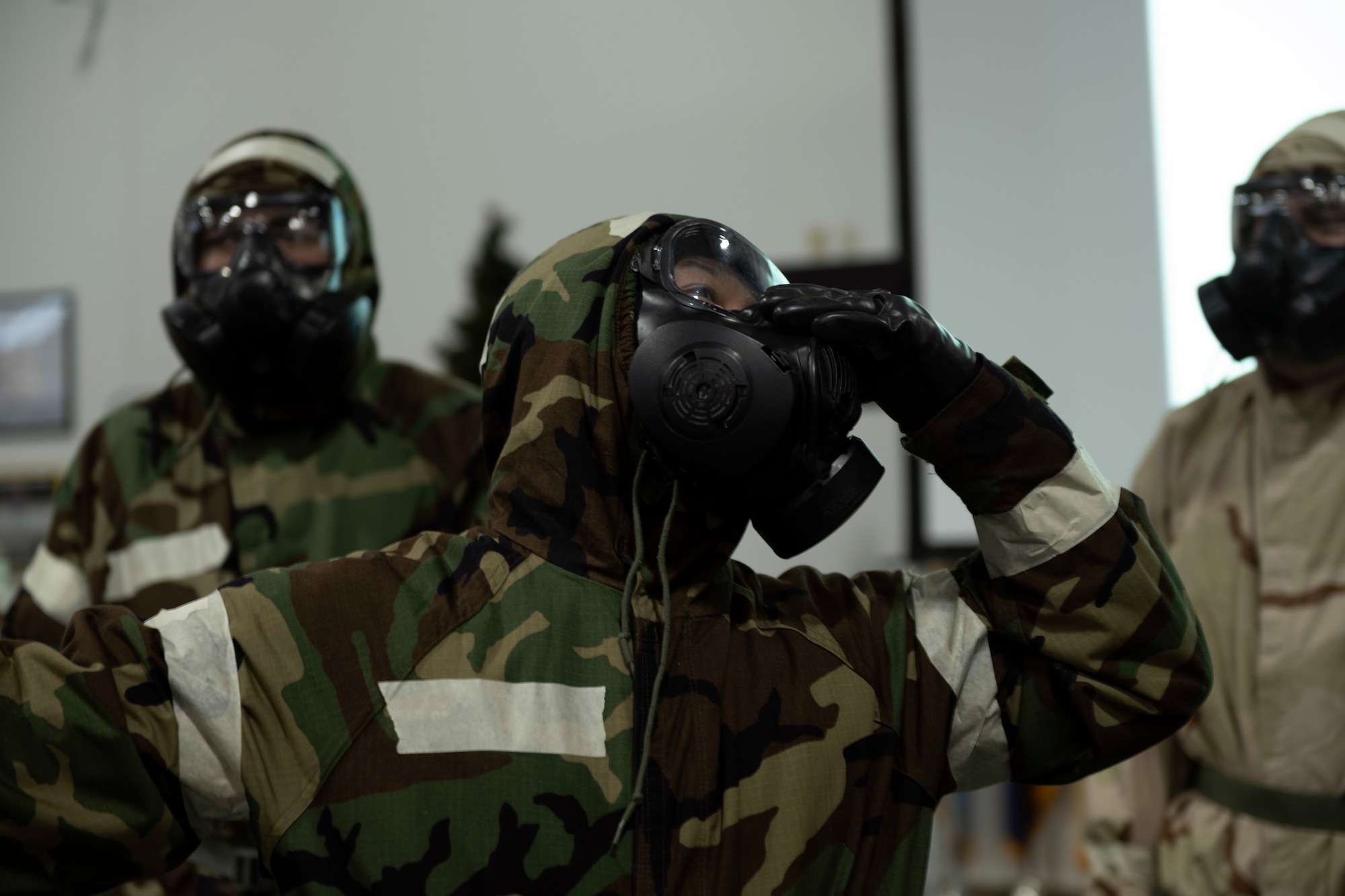 Photos of 821st CRS Airmen conducting training.