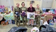 Sgt. 1st Class Gina Vaile-Nelson, Sgt. Jessica Jenkins, Staff Sgt. Billie Jacobs, Staff Sgt. Rachel Pete raised over $2,500 for Kentucky’s First Lady, Britainy Beshear's Western Kentucky Toy Drive. (U.S. Army National Guard photo by Sgt. 1st class Benjamin Crane)