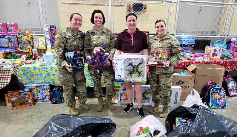 Sgt. 1st Class Gina Vaile-Nelson, Sgt. Jessica Jenkins, Staff Sgt. Billie Jacobs, Staff Sgt. Rachel Pete raised over $2,500 for Kentucky’s First Lady, Britainy Beshear's Western Kentucky Toy Drive. (U.S. Army National Guard photo by Sgt. 1st class Benjamin Crane)