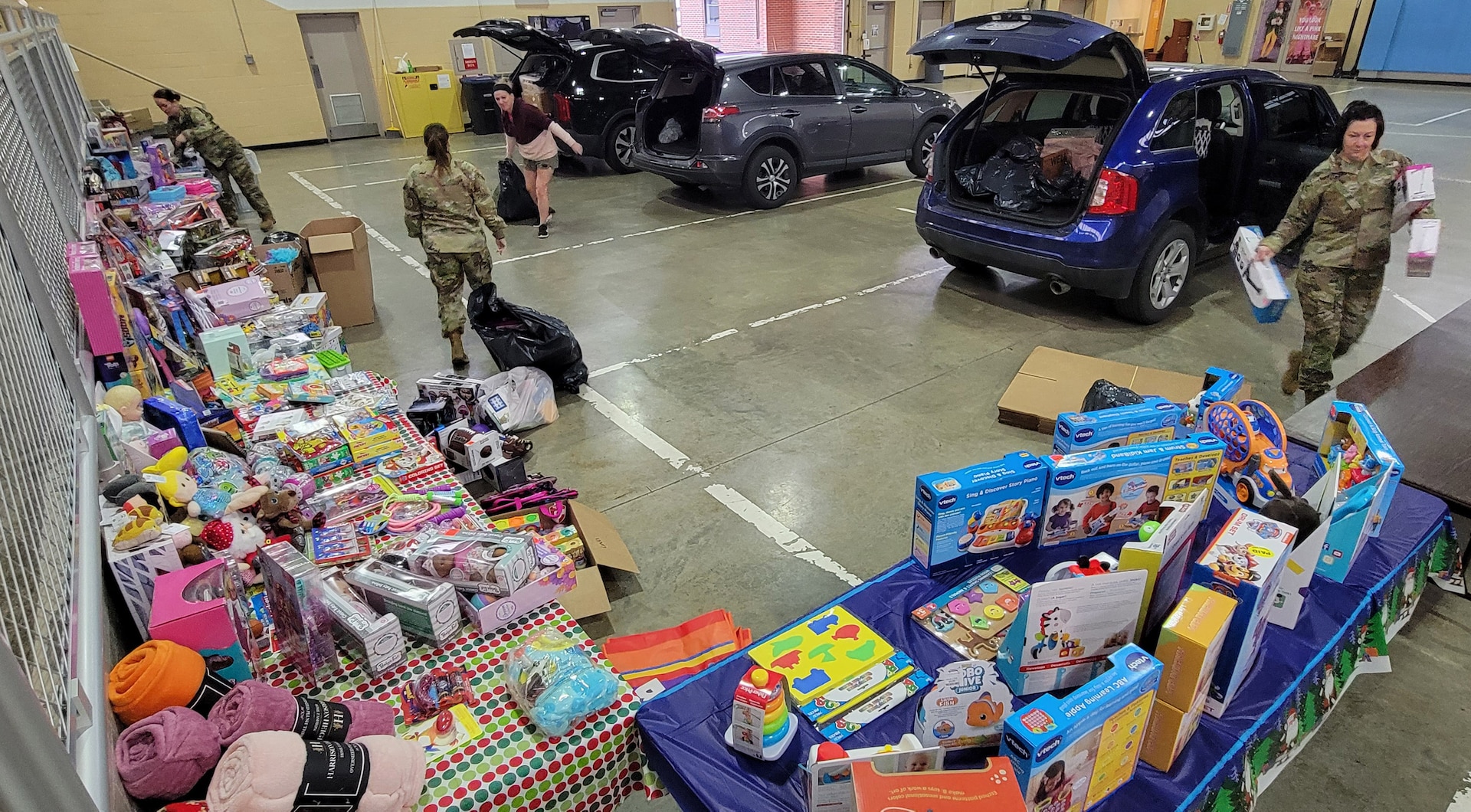 Sgt. 1st Class Gina Vaile-Nelson, Sgt. Jessica Jenkins, Staff Sgt. Billie Jacobs, Staff Sgt. Rachel Pete raised over $2,500 for Kentucky’s First Lady, Britainy Beshear's Western Kentucky Toy Drive. (U.S. Army National Guard photo by Sgt. 1st class Benjamin Crane)