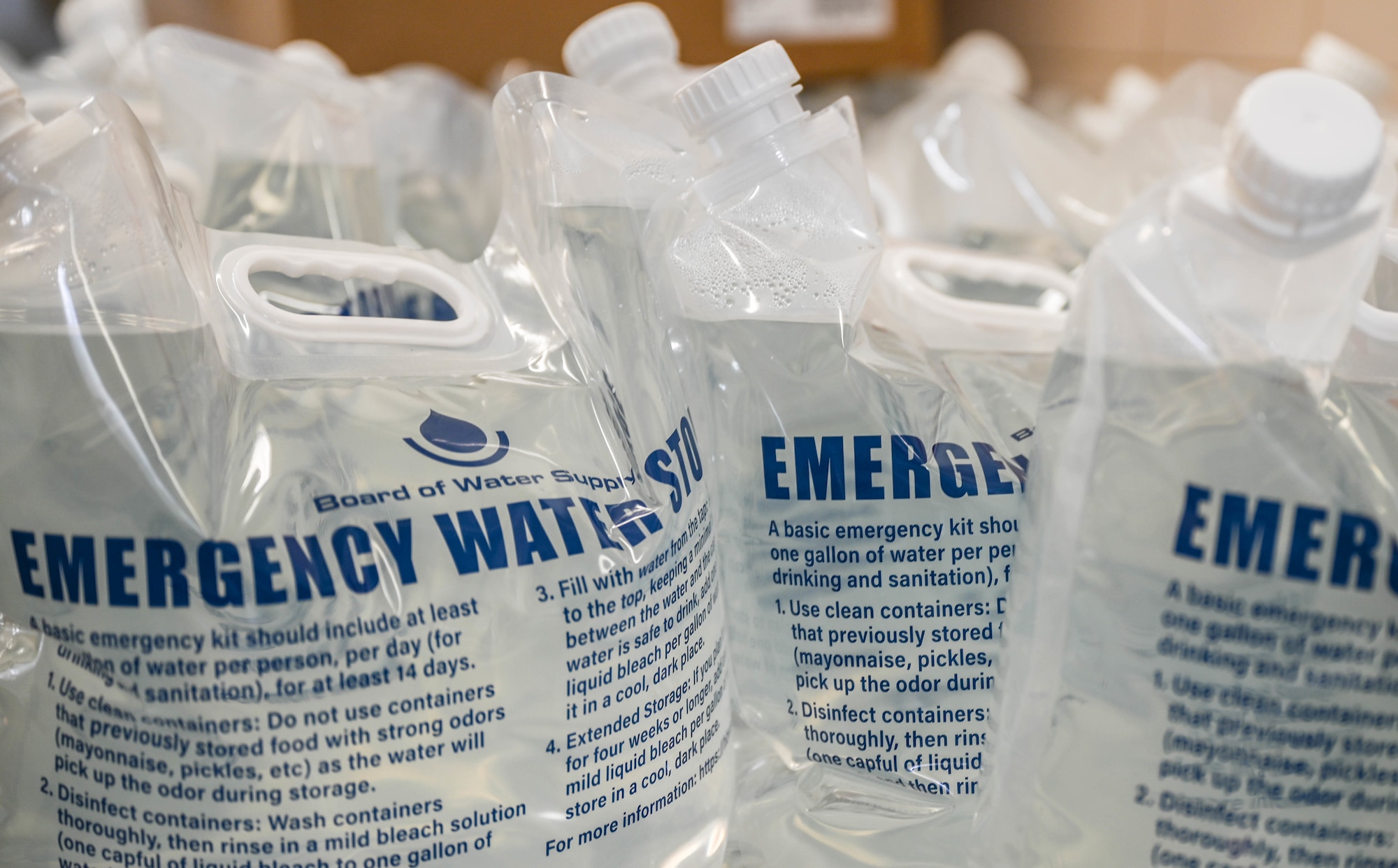 Several storage bags containing potable water sit inside the Hale Aina Dining Facility at Joint Base Pearl Harbor-Hickam, Hawaii, Dec. 16, 2021. Night-shift food service personnel are responsible for refilling all containers with potable water before the next morning so food can be prepared first thing the next day. Approximately 80 gallons of water is used for cooking and cleaning each day. (U.S. Air Force photo by Staff Sgt. Alan Ricker)