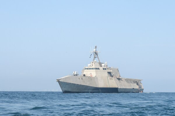 PACIFIC OCEAN (Aug. 16, 2021) The Independence-variant littoral combat ship USS Kansas City (LCS 22) transits the Pacific Ocean during routine operations at sea. Kansas City is a fast, agile, mission-focused platform designed to operate near the shore against 21st-century coastal threats. The LCS is capable of supporting missions, forward presence, maritime security, sea control, and deterrence. (U.S. Navy photo by Mass Communication Specialist 2nd Class Vance Hand/Released)