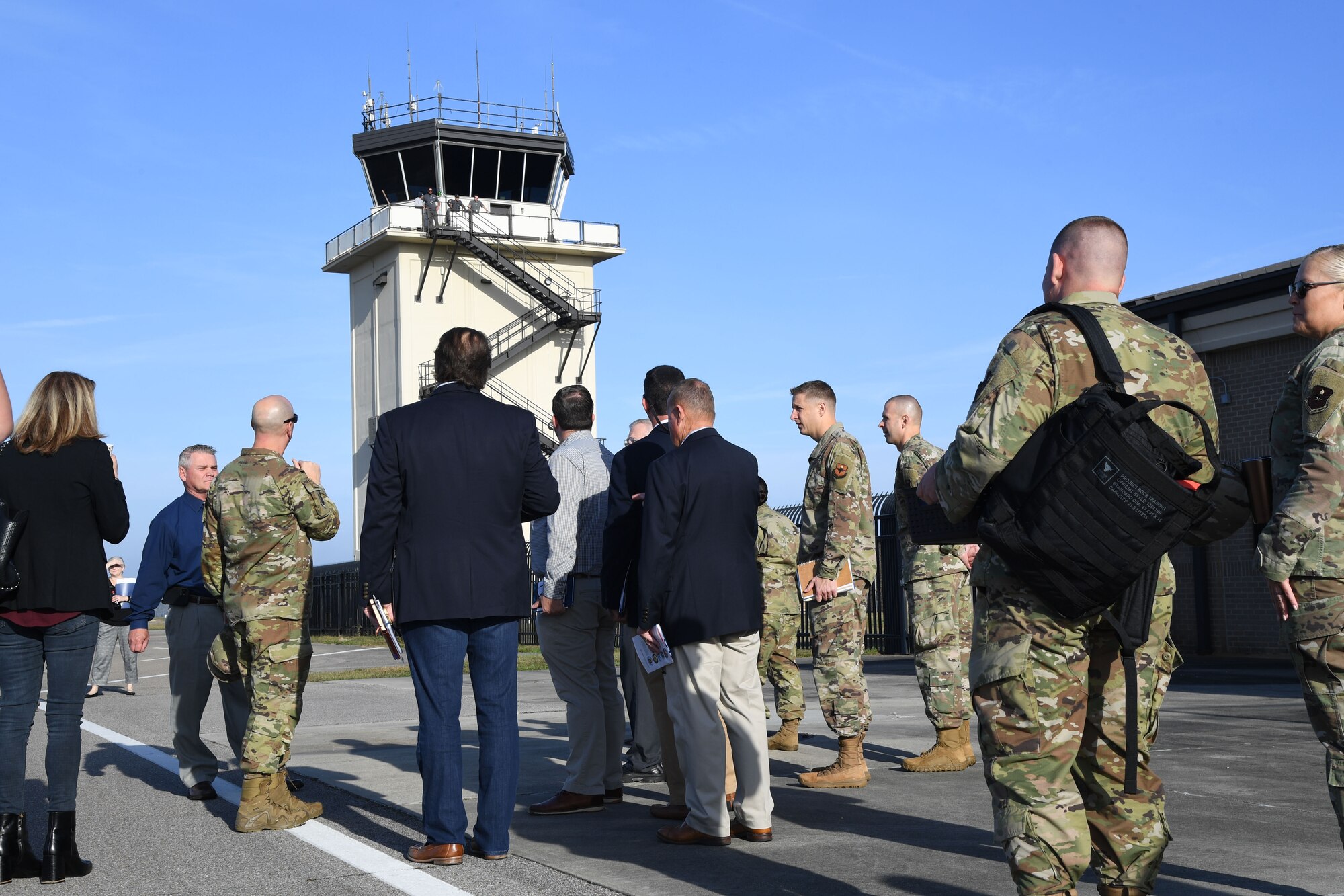 U.S. Air Force Col. William Hunter, 81st Training Wing commander, briefs Keesler Civic Leaders on the mission capabilities of the air traffic control tower at Keesler Air Force Base, Mississippi, Dec. 16, 2021. The 81st Training Wing's Operations Support Flight monitors and directs the aircraft on the flightline and local airspace, ensuring the fluidity of the air traffic. (U.S. Air Force photo by Kemberly Groue)