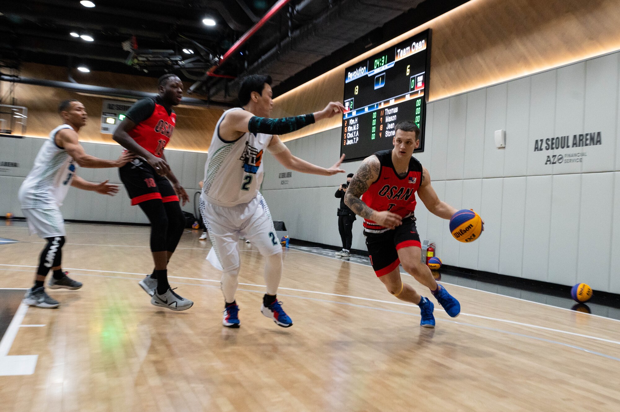 A1C Mason Cambbell, 51st Medical Group, aerospace medical squadron technician, drives the ball during Haetaewarning3 basketball game at AZ Seoul Arena