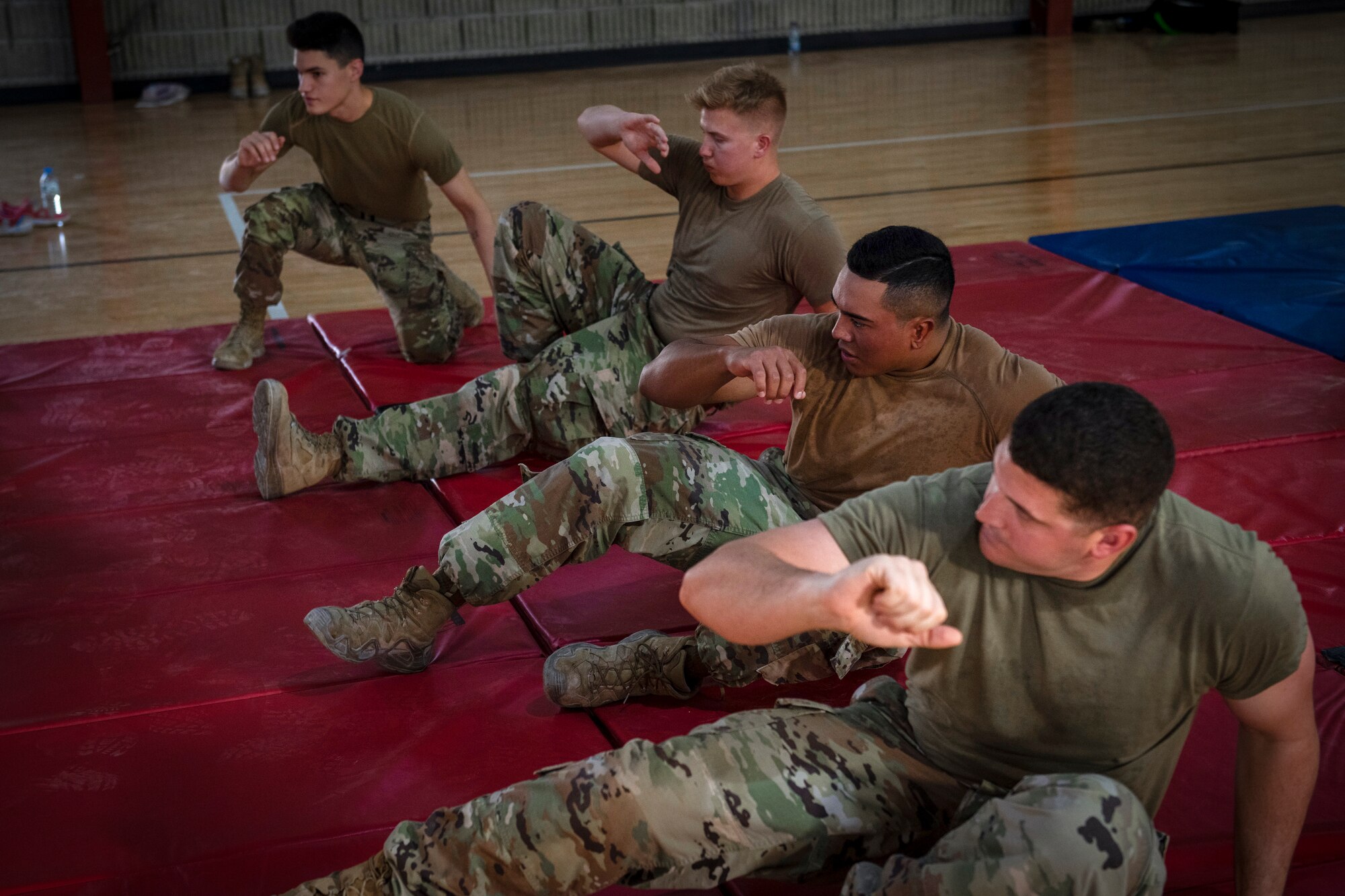 Airmen practice martial arts moves during training.