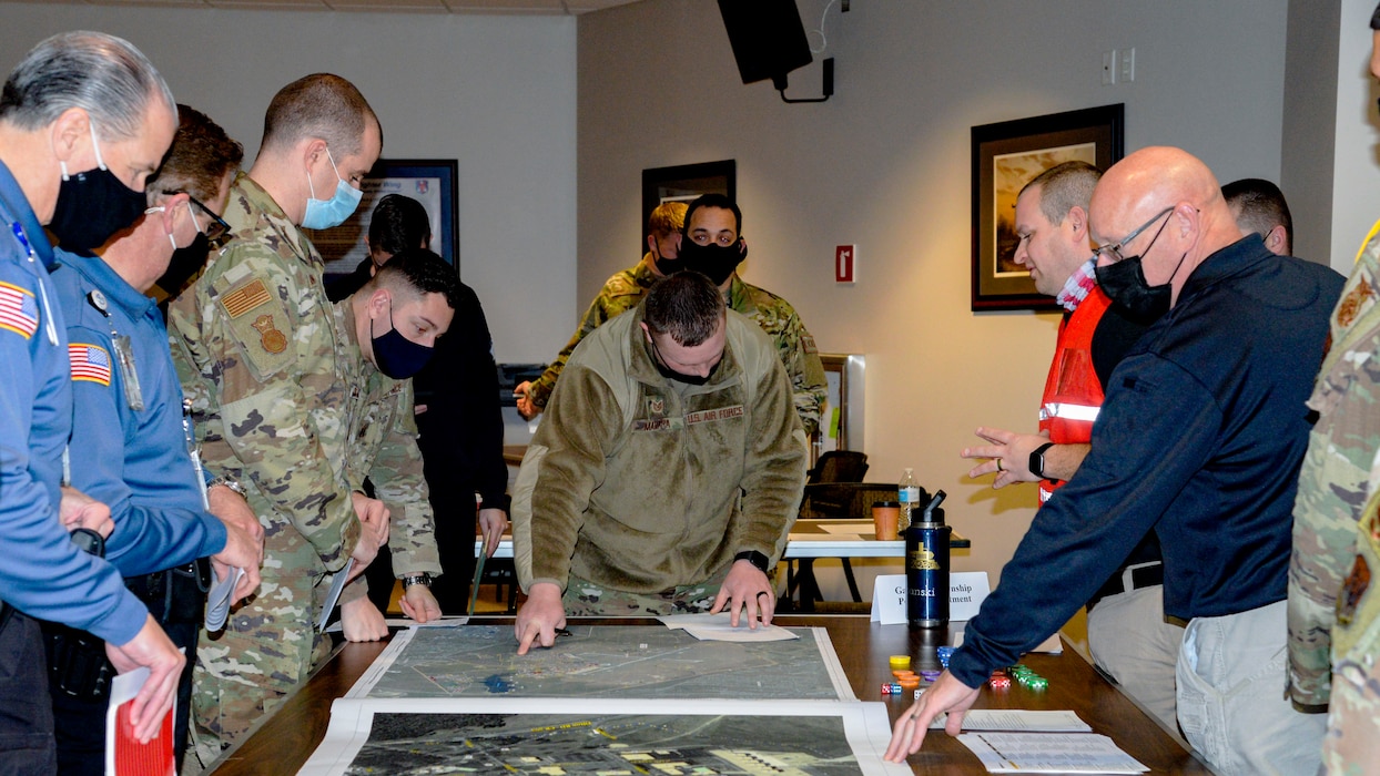 Leaders and managers of local New Jersey agencies participate in a tabletop Active Shooter Response exercise Dec. 16, 2021, at the 177th Fighter Wing, Egg Harbor Twp., N.J. The 177FW hosted the New Jersey Office of Homeland Security and Preparedness' tabletop class for local agencies such as the FBI, the New Jersey State Police, and the Federal Aviation Administration. (U.S. Air National Guard photo by Senior Airman Hunter Hires)