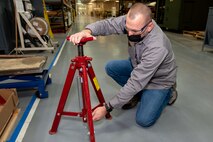 Photo of Michael Lazowski performing an equipment inspection