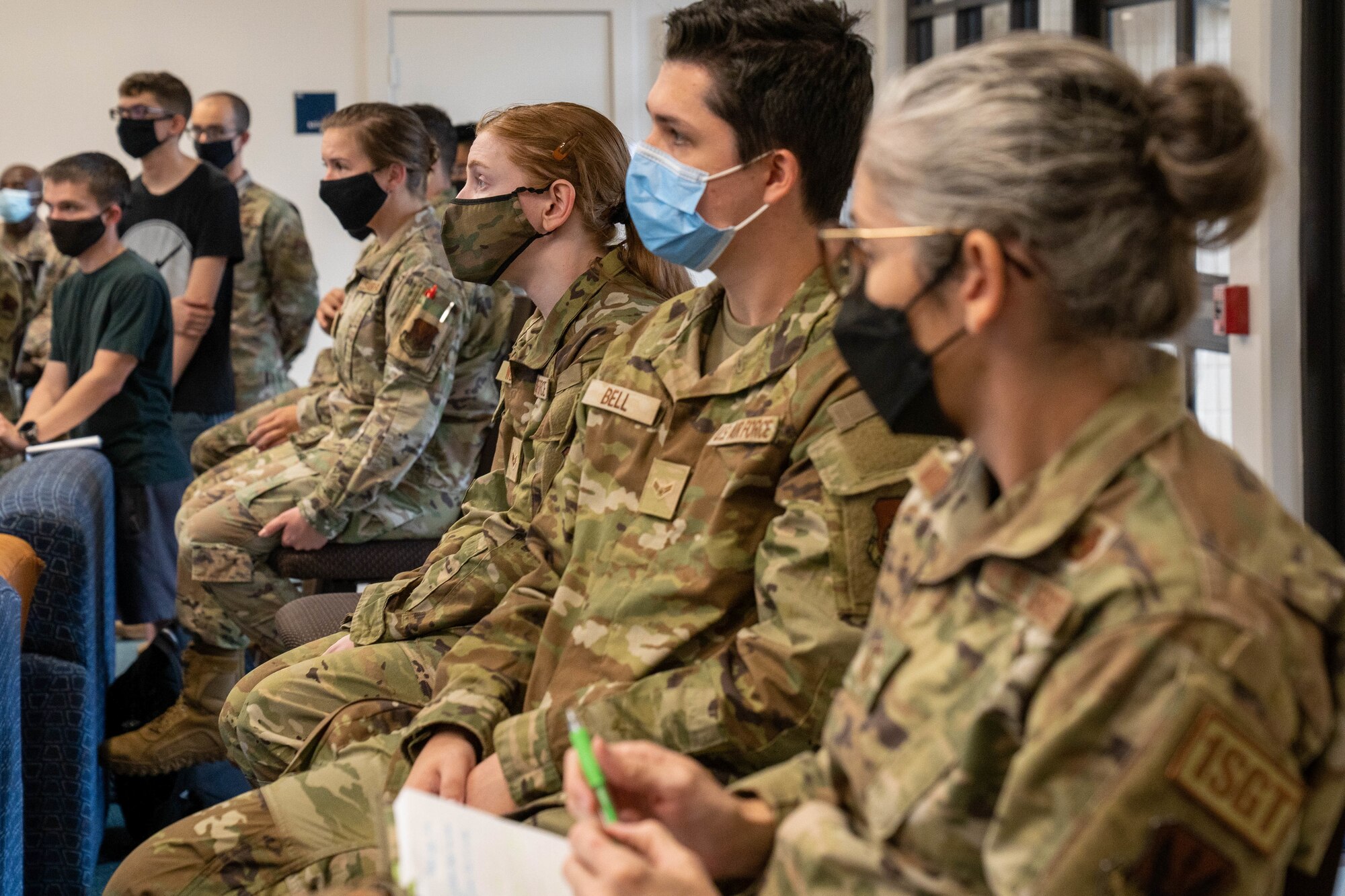 Joint Base Pearl Harbor-Hickam Airmen listen to leadership address the water situation during a town hall for dorm residents at Joint Base Pearl Harbor-Hickam, Hawaii, Dec. 16, 2021. Air Force leadership came together to address questions and concerns coming from Airmen living in the dorms regarding the water quality recovery efforts ensuring the concerns about health and safety of each resident is heard. (U.S. Air Force photo by Airman 1st Class Makensie Cooper)