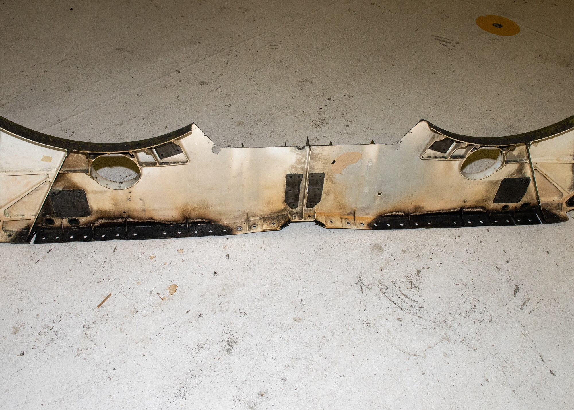 Damaged F-22 aircraft part.