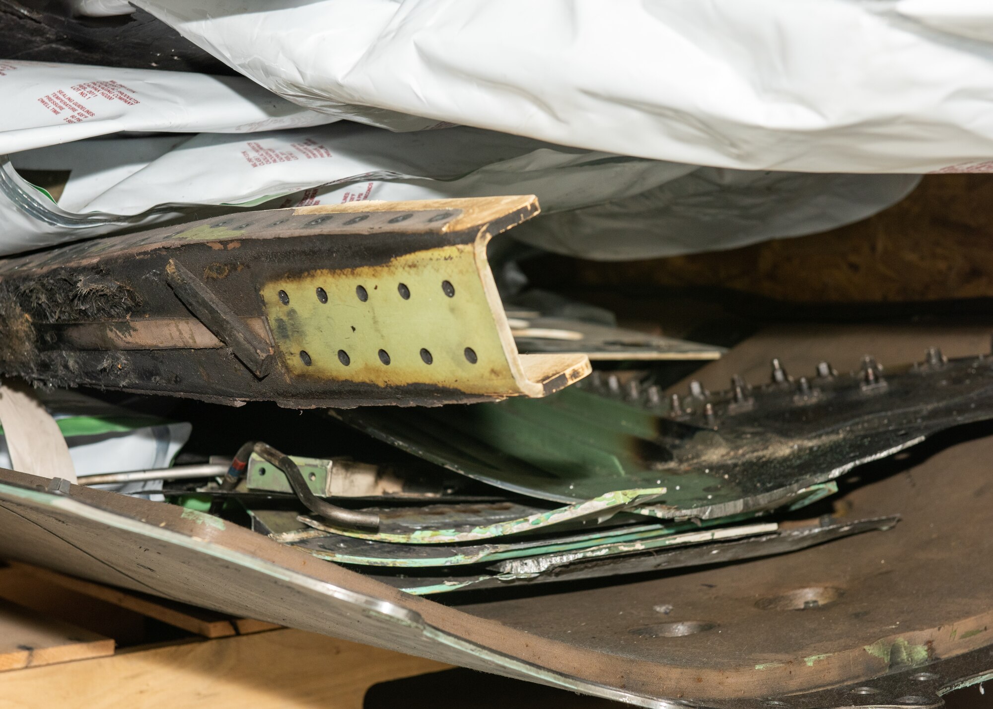 Damaged parts from an F-22 aircraft.