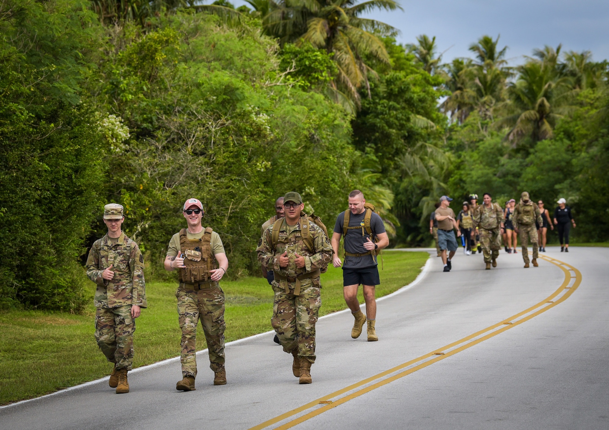 Members of Team Andersen ruck/walk during the annual Office of Special Investigations Memorial Ruck at Andersen Air Force Base, Guam, Dec. 21, 2021.