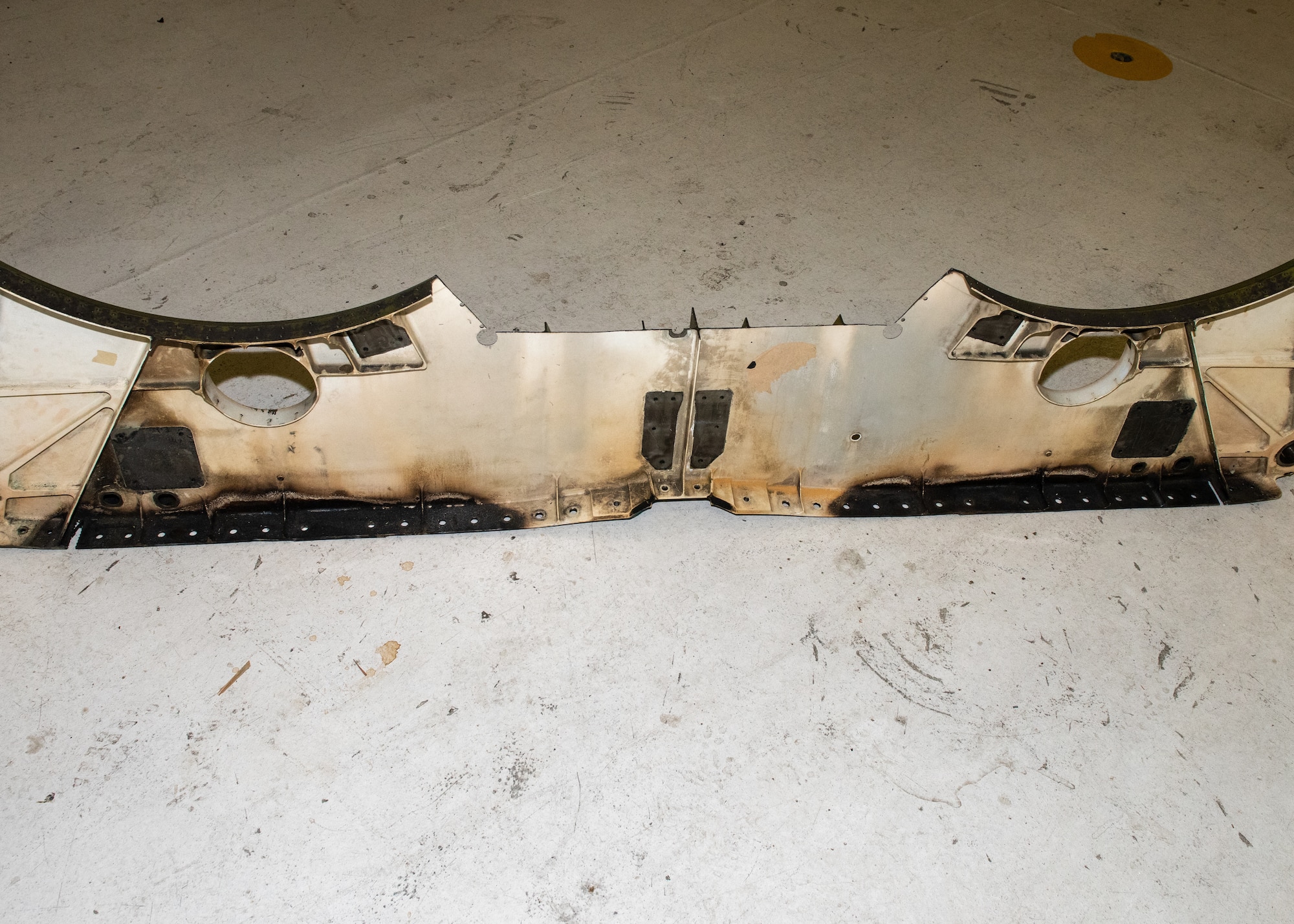 Damaged F-22 aircraft part.