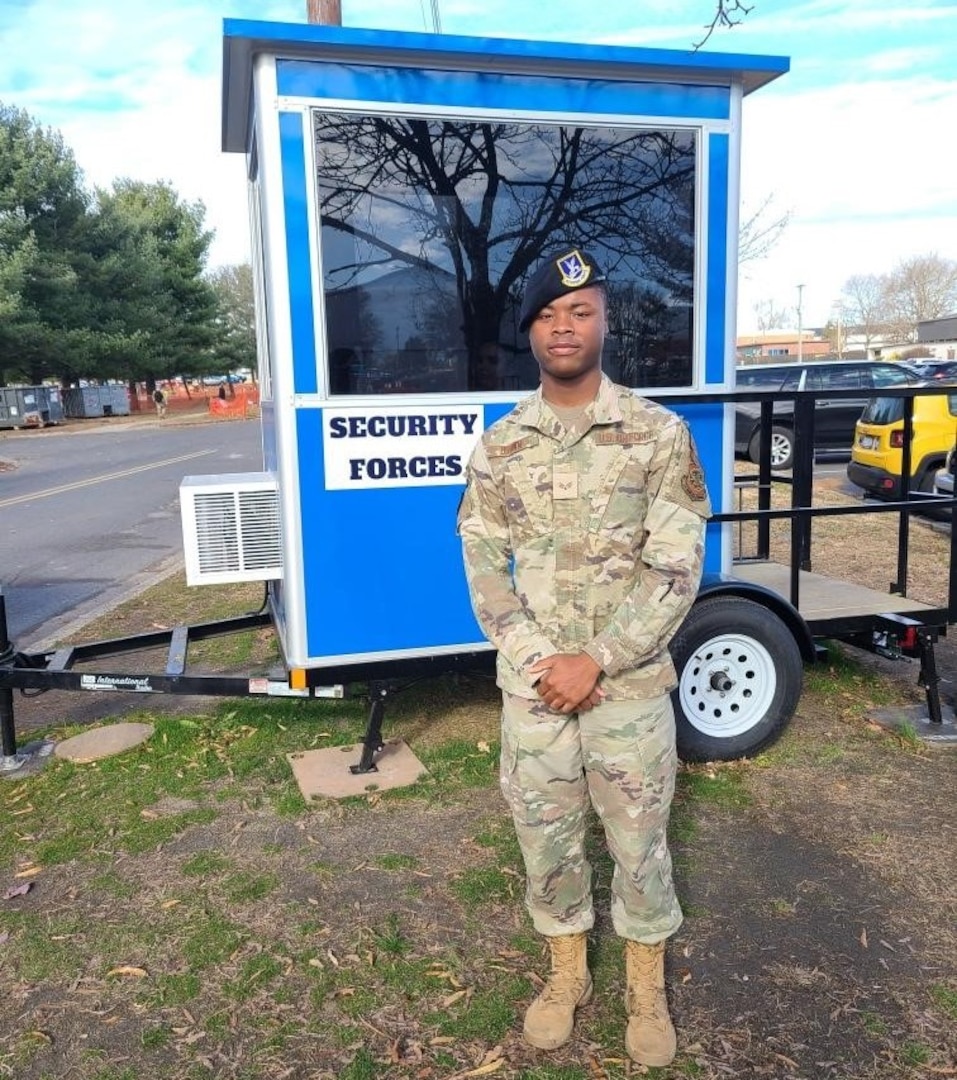 Defender in front of transportable guard booth