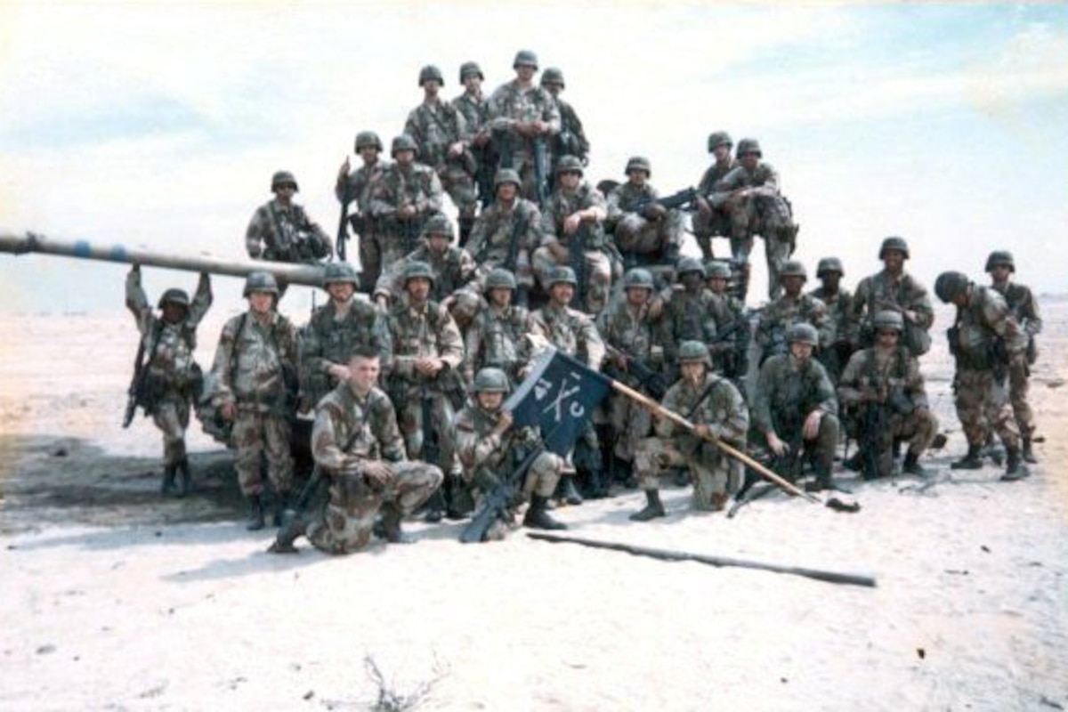Soldiers pose for a photo.