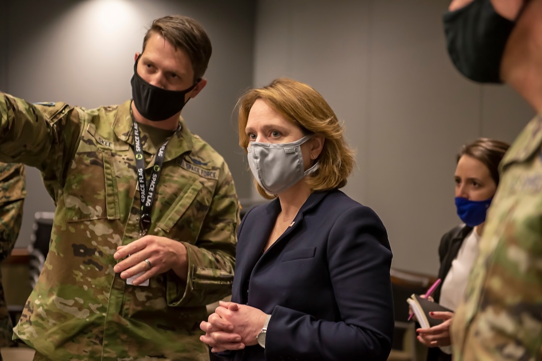 •	U.S. Space Force Capt. Benjamin Skee, SPACE FLAG Exercise Director, provides Dr. Kathleen Hicks, the Deputy Secretary of Defense, an overview of mission planning activities during SPACE FLAG 22-1 at Schriever Space Force Base, Colorado, Dec. 13, 2021. (U.S. Space Force photo by Judi Tomich)