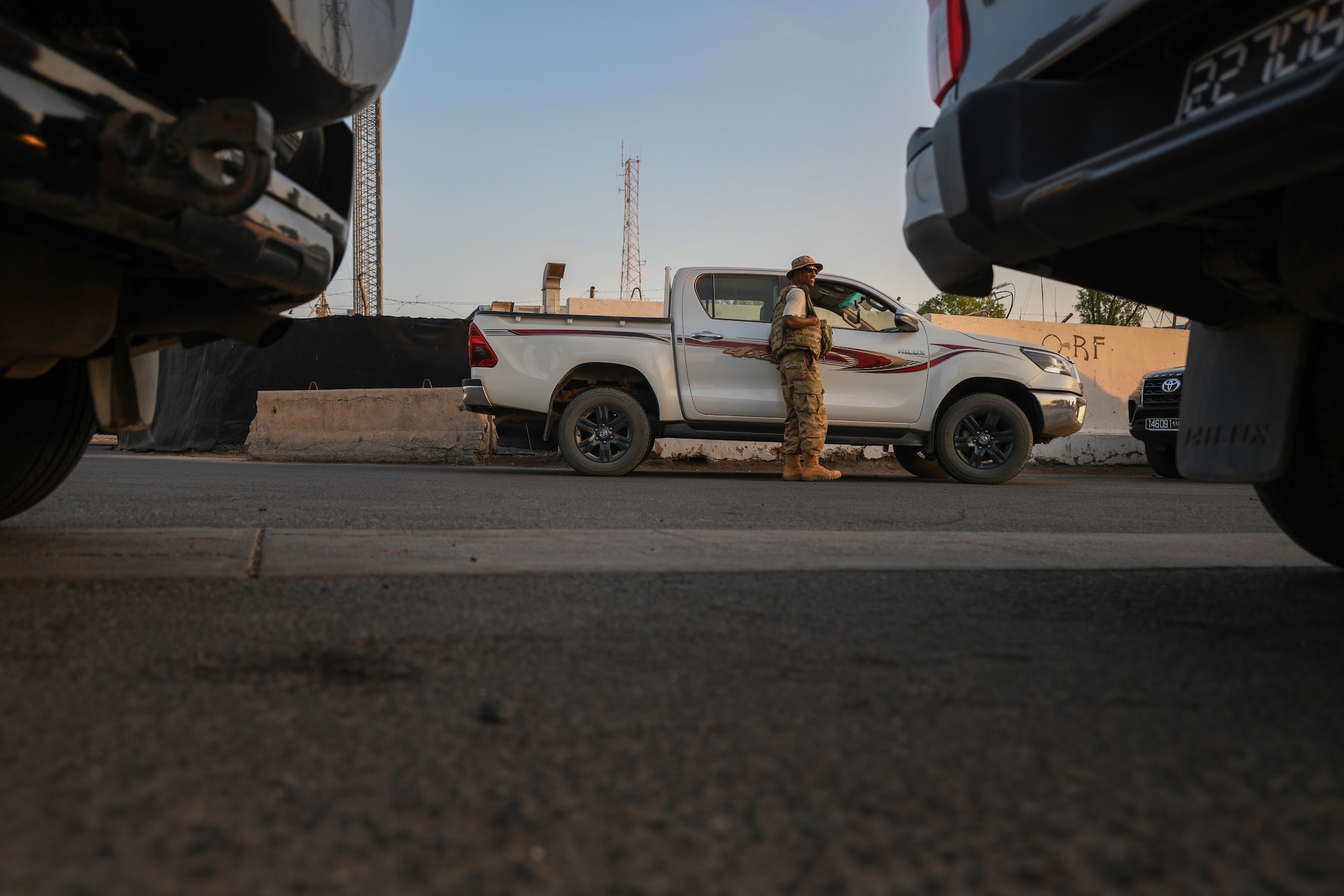 U.S. Air Force Senior Airman Erek Bowens, 776th Expeditionary Air Base Squadron heavy equipment operator, waits for a convoy to Chabelley Airfield from Camp Lemonnier Djibouti, Dec. 8, 2021. Bowen’s mission at Chabelley Airfield is to support base infrastructure while also ensuring an operational airfield. (U.S. Air Force photo by Senior Airman Ericka A. Woolever)