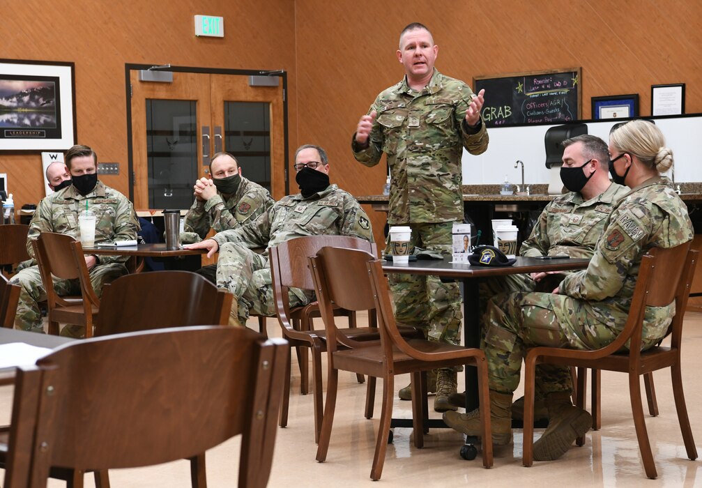 Washington Air National Guard Senior Master Sgt. Christopher Martin, 194th Security Force Flight, addresses other members of the Top 3 Council during the October Regularly Scheduled Drill, at the 194th Wing’s Dinning Facility at Camp Murray, Washington Oct. 3, 2021. Martin, a candidate for the Top 3 Council President discussed the importance of the groups work to mentor Airmen in the Washington Air National Guard. (National Guard photo by Master Sgt. John Hughel, Washington Air National Guard public Affairs)