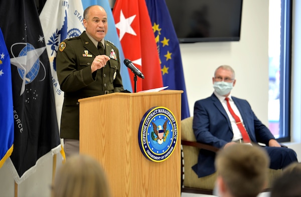 Army Lt. Gen. David Bassett, Defense Contract Management Agency director, speaks to a crowd.
