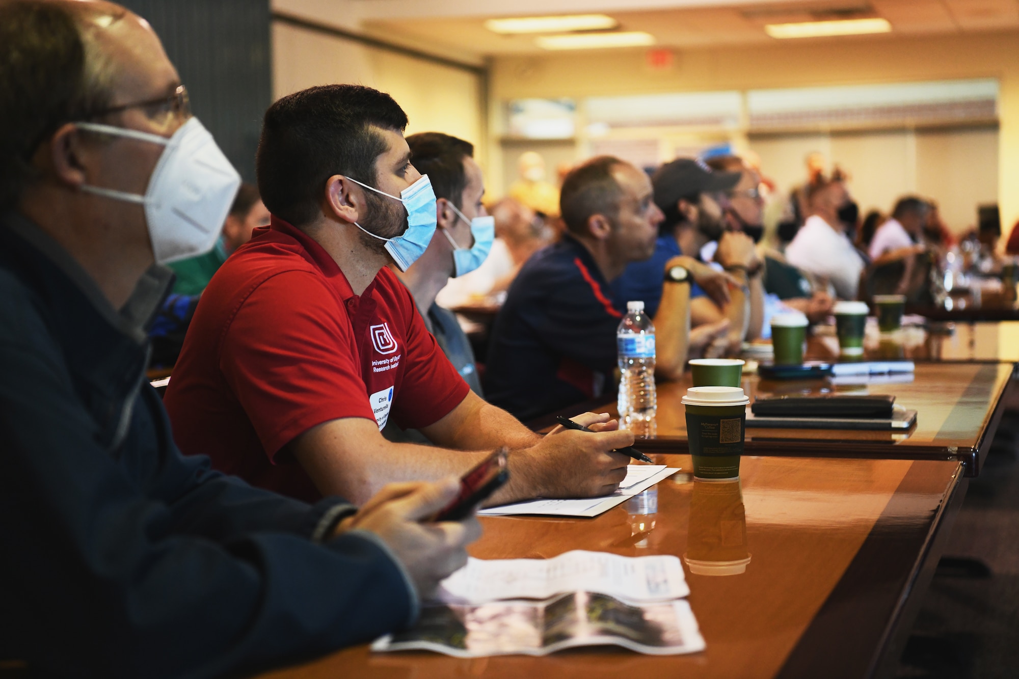 More than 50 representatives from different community partners and organizations listen to a mission brief Sept. 16, 2021 during Community Day at the 178th Wing in Springfield, Ohio. The event enhanced awareness of the missions and capabilites of the wing. (U.S. Air National Guard photo by Shane Hughes)