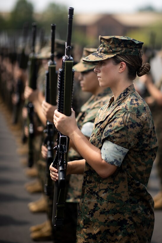 U.S. Marine Corps officer candidates with Lima Company participate in a close order drill competition at Officer Candidates School on Marine Corps Base Quantico, Virginia, Aug. 9, 2021. Close order drill instills discipline by increasing precision, response to orders and confidence within the candidates. (U.S. Marine Corps photo by Tia Dufour)