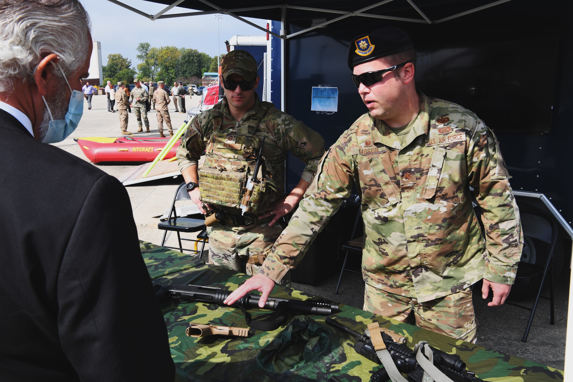 U.S. Air Force Maj. Michael Gibson, commander of the 178th Wing Security Forces Squadron, explains the capabilities of the equipment used by his Airmen during Community Day Sept. 16, 2021 at the 178th Wing in Springfield, Ohio. The event enhanced awareness of the missions and capabilites of the wing. (U.S. Air National Guard photo by Shane Hughes)